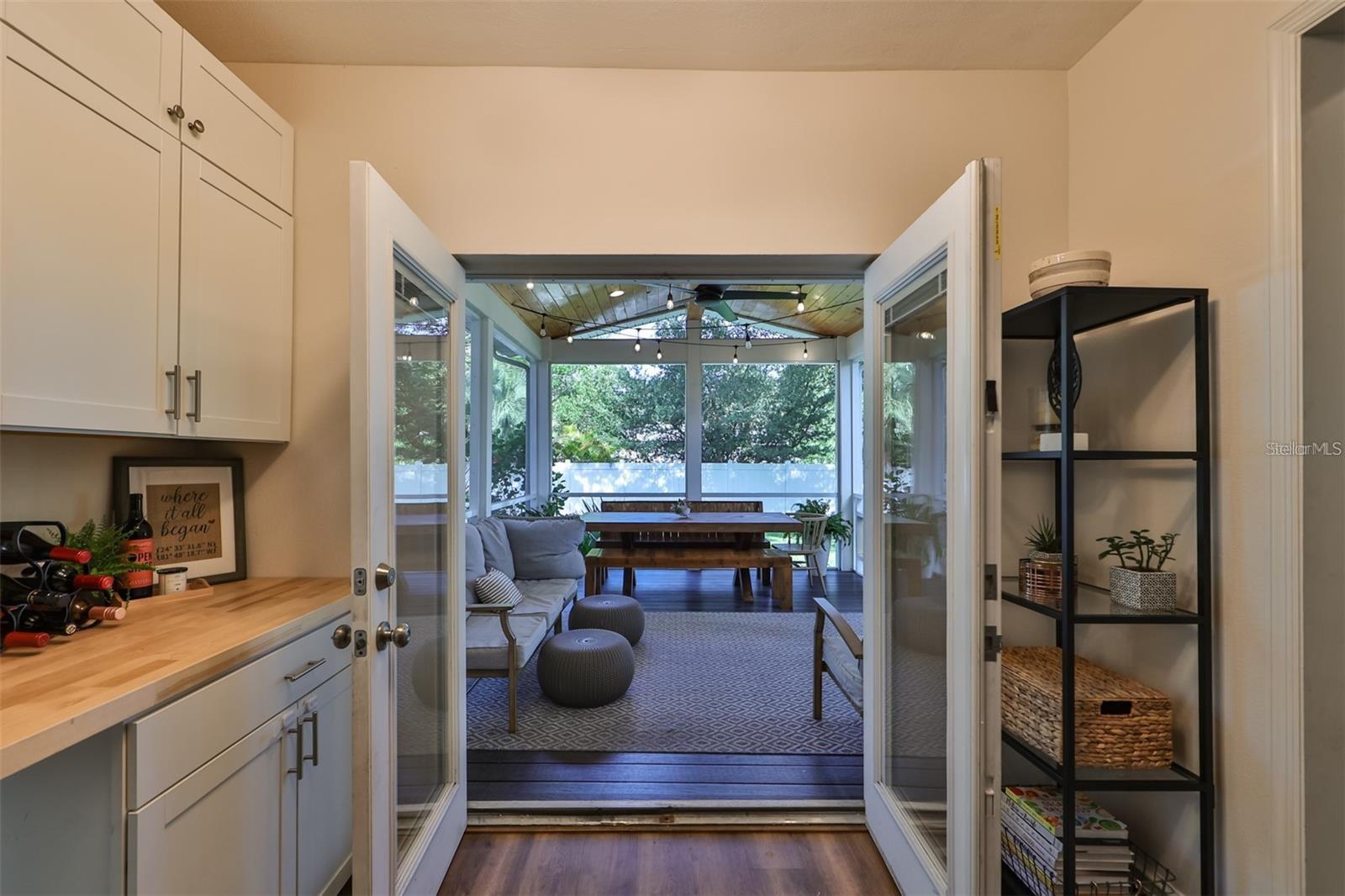 Lovely foyer area leading to backyard porch.