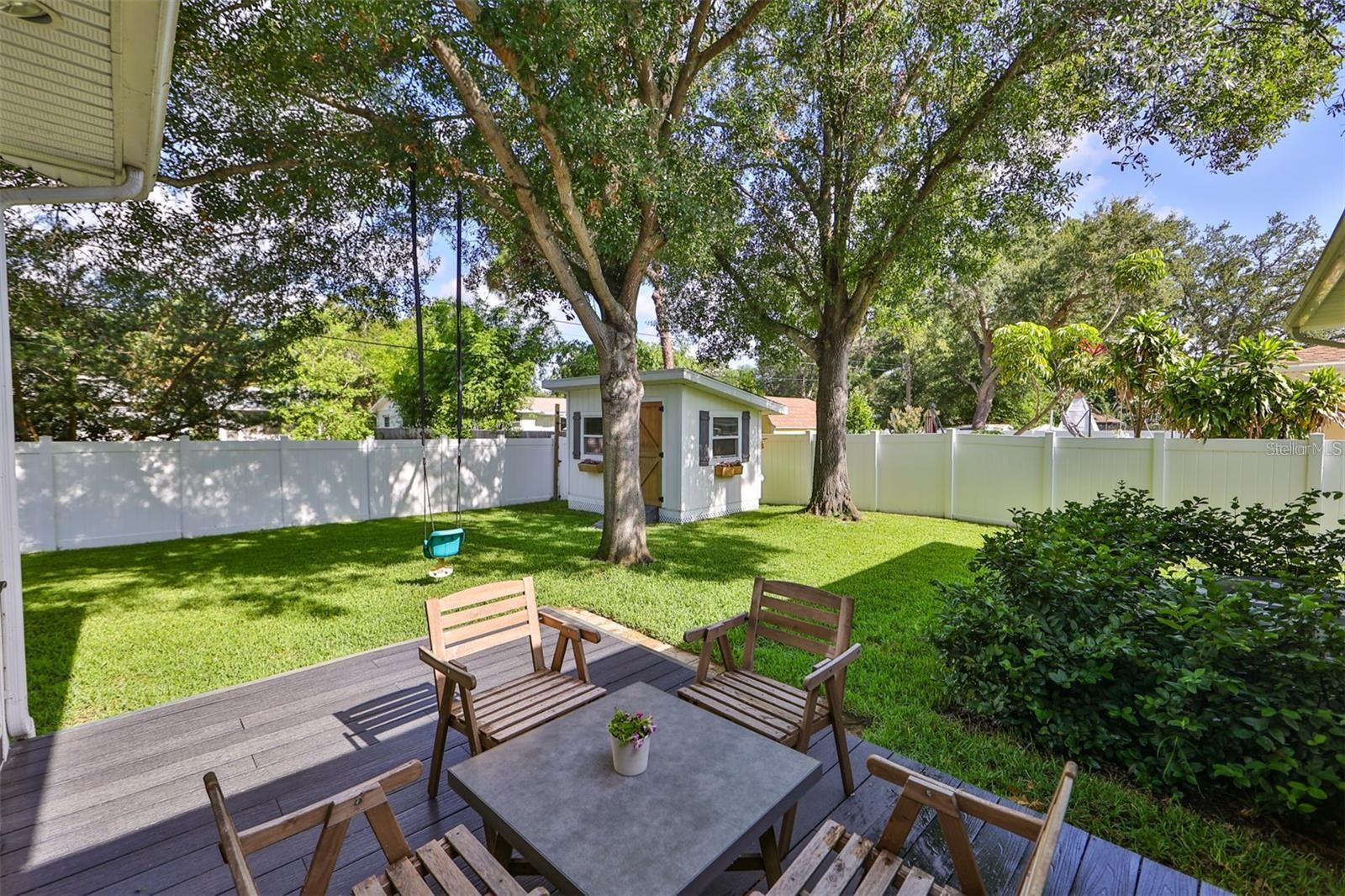 Backyard luxury vinyl deck. Perfect for leisure.