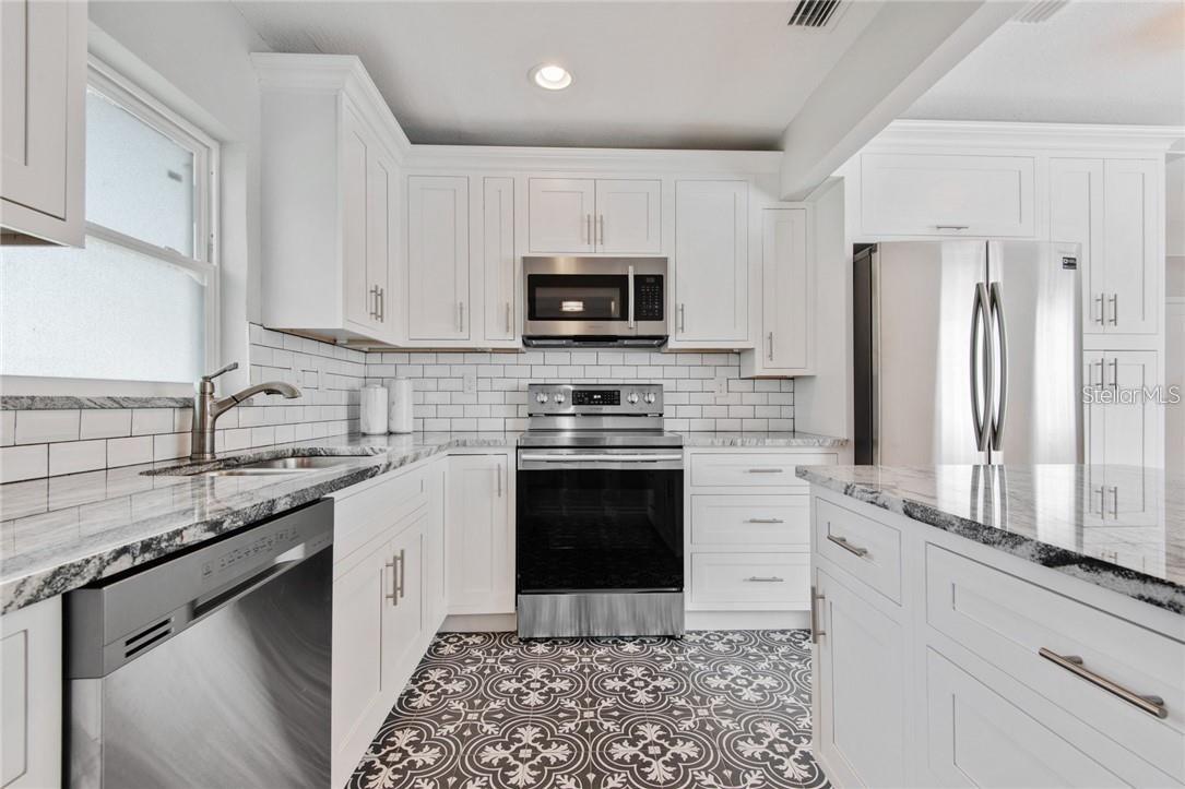 Mid century modern and sleek kitchen.