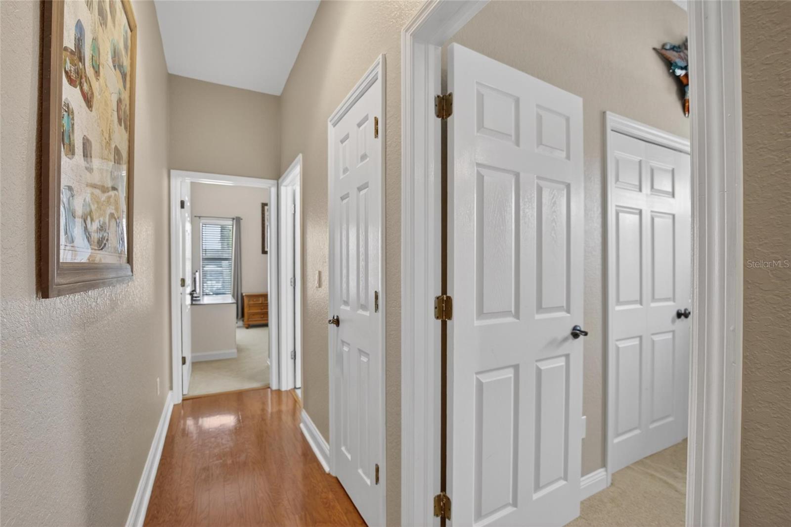 Hallway to Secondary Bedrooms: Bedroom #2 on Right - Bedroom #3 in Background
