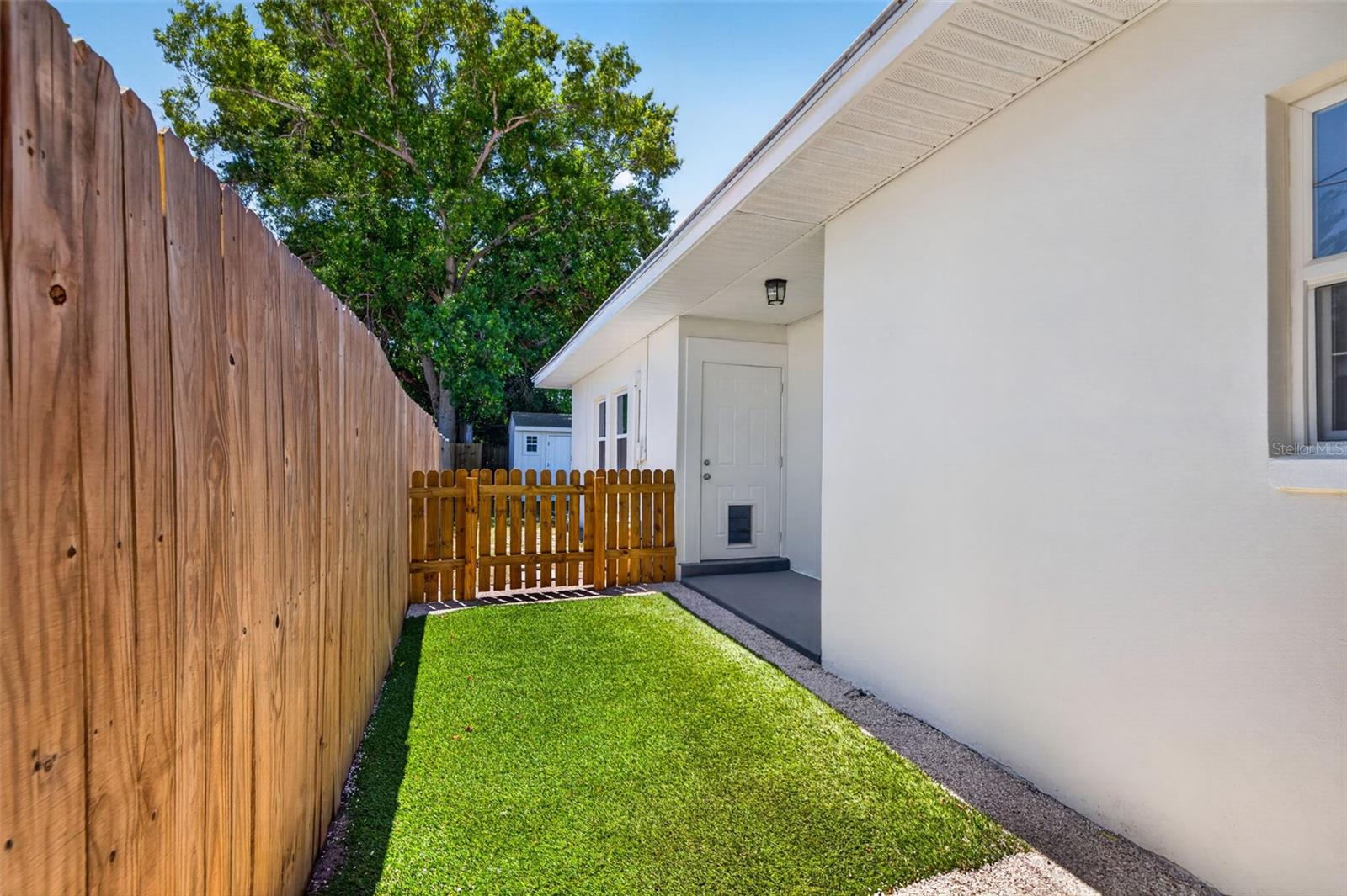 Sideyard w/ Turf Dog Area