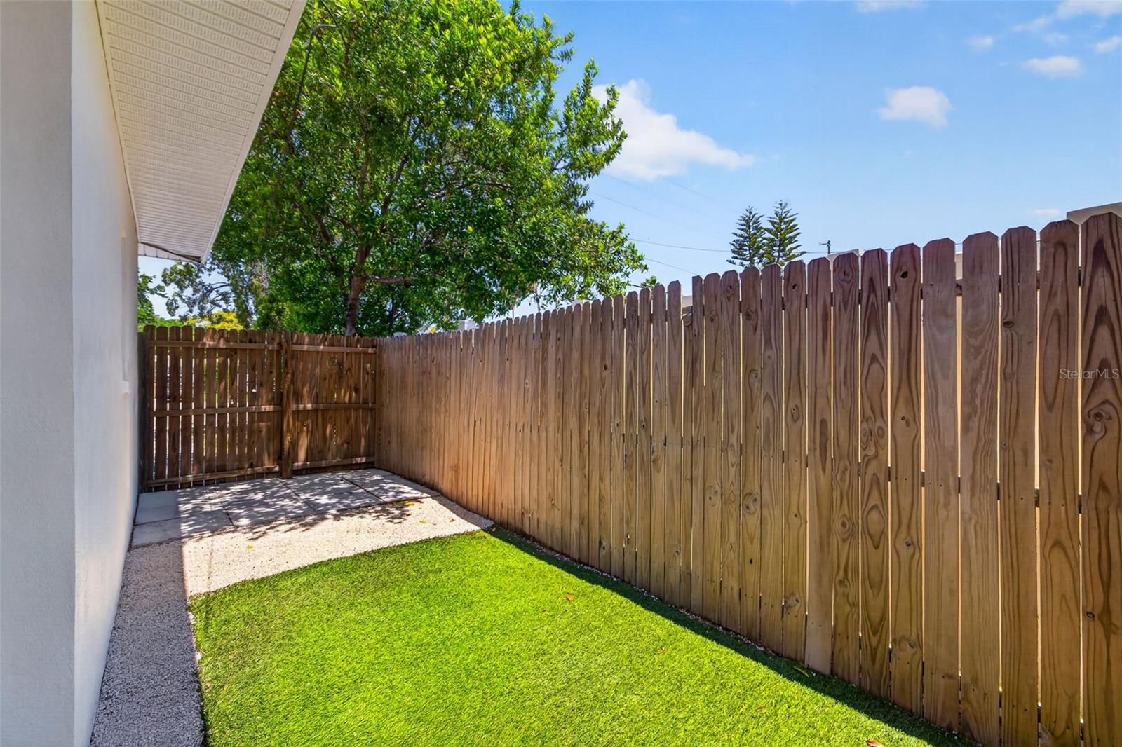 Sideyard w/ Turf Dog Area