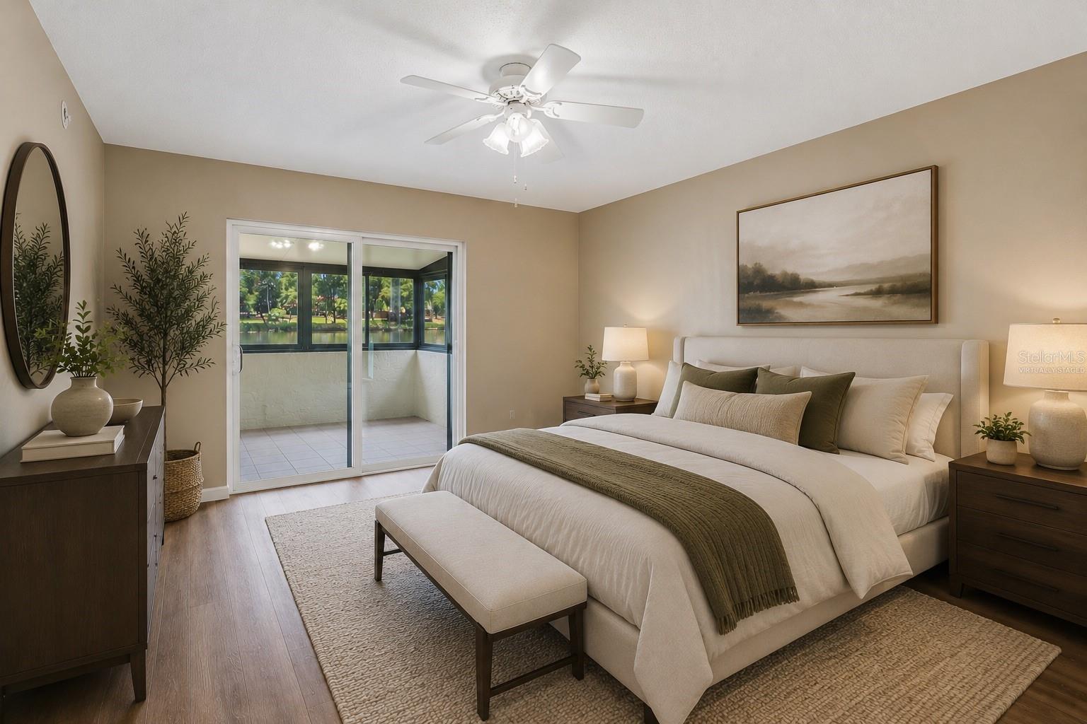 Virtually staged primary bedroom with 1/2 bath
