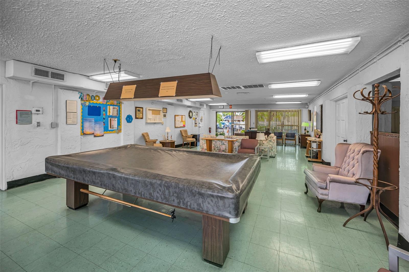 "rack 'em up" play pool at the clubhouse