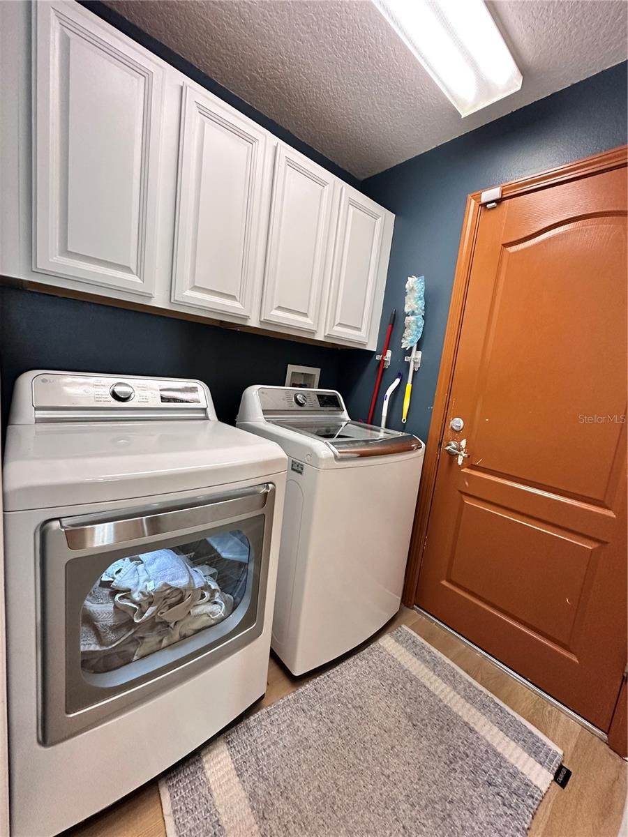 Laundry room that leads to the garage