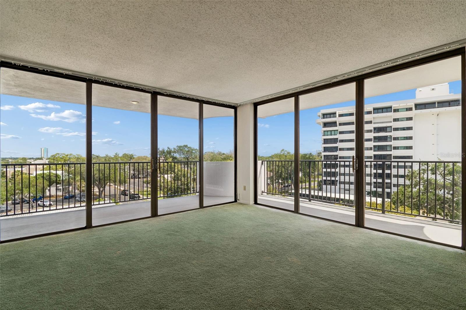 Floor to Ceiling Sliders and Balcony!