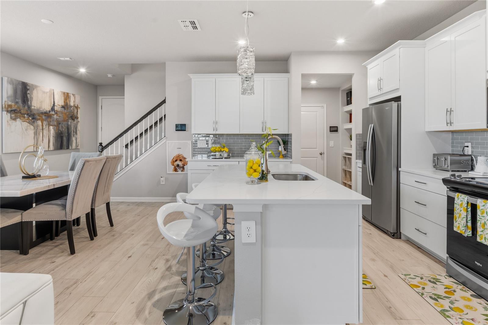 Formal dinning to the left, kitchen to the right
