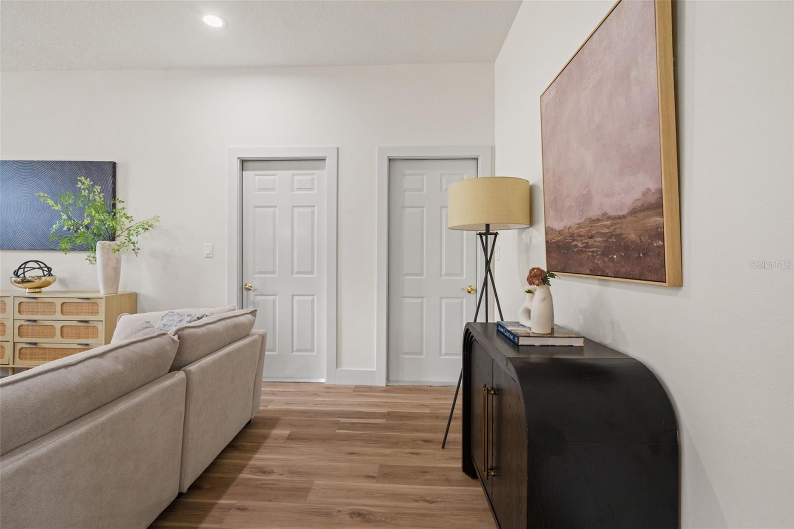 entry to garage (left) and left-side of home rear porch (right)