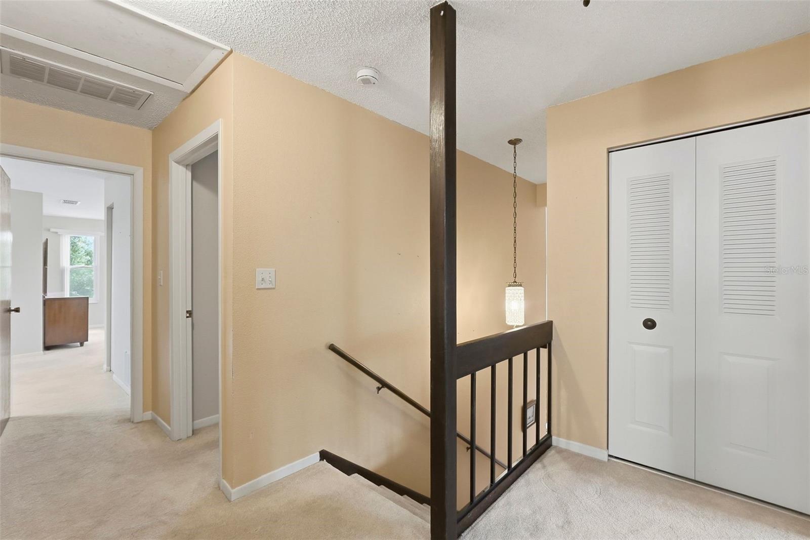 At the top of the stairs on the 2nd floor and large linen closet.