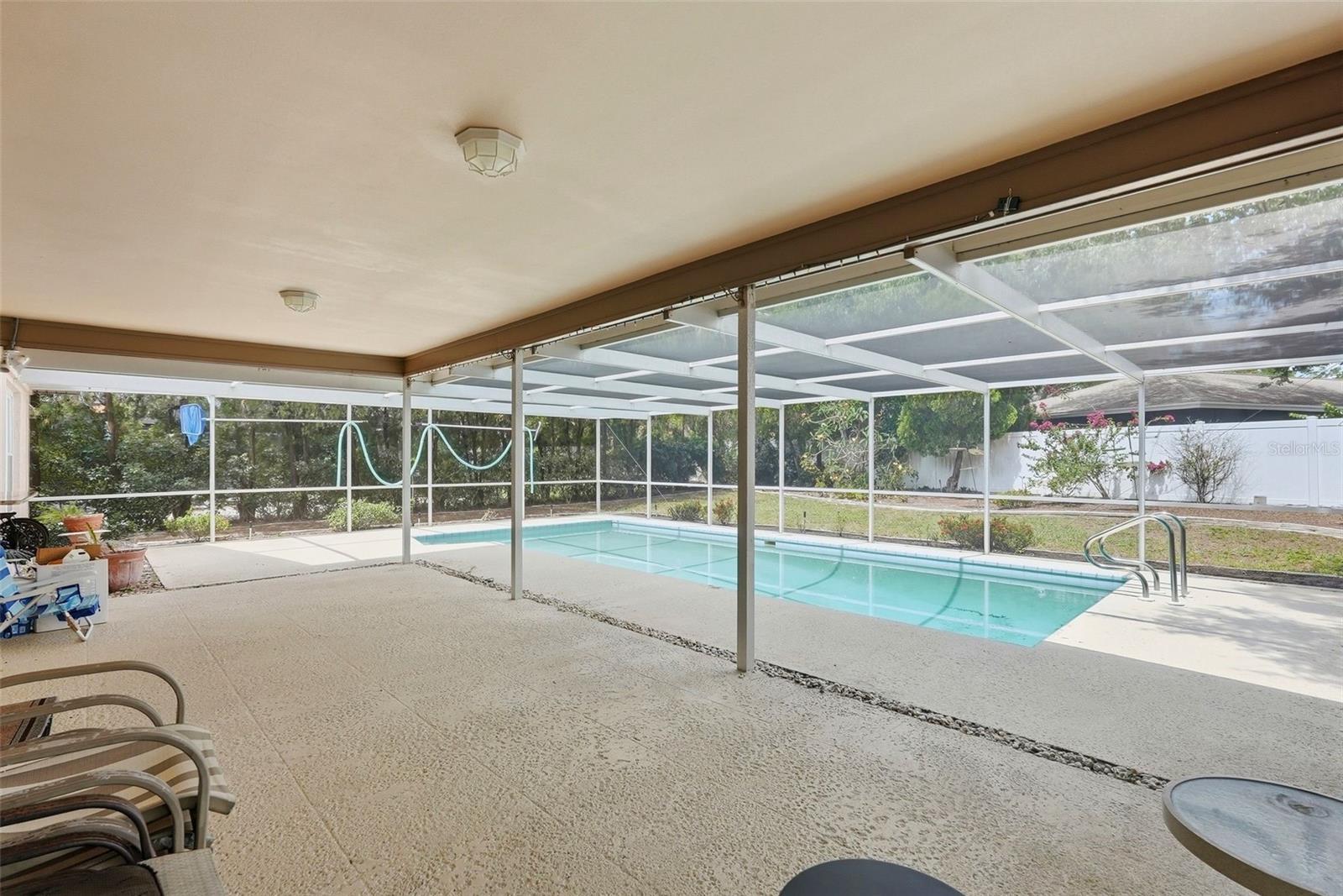 Covered and Screened Pool area