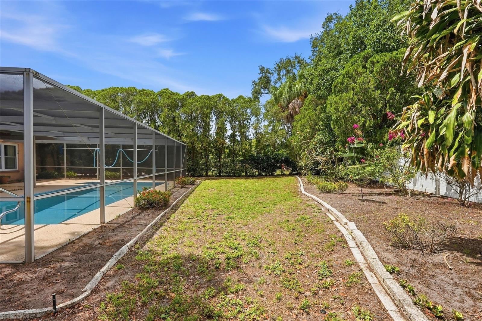 Gorgeous landscaped yard .23 of an acre in size