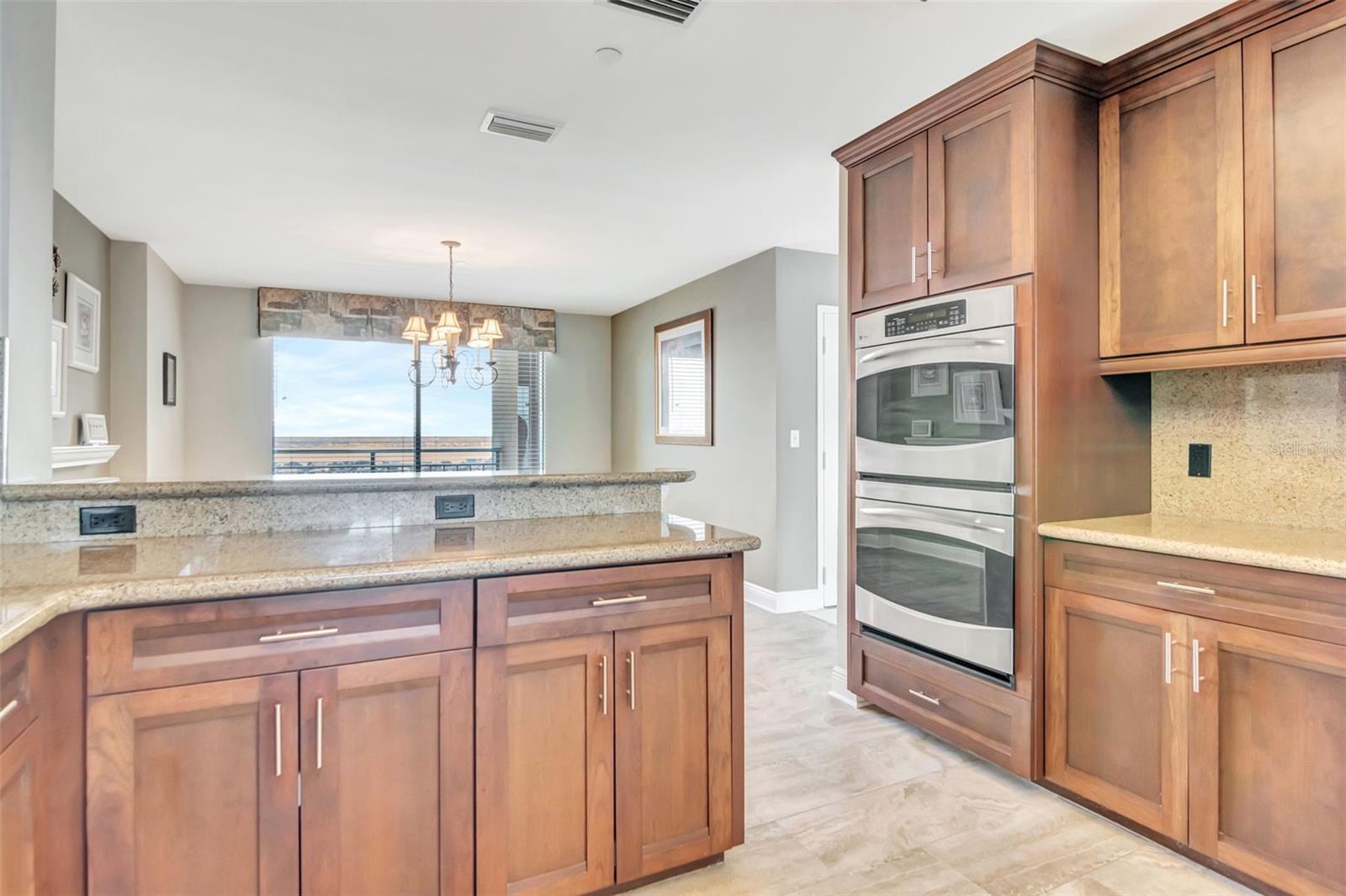 Kitchen opens to dining room and large living room