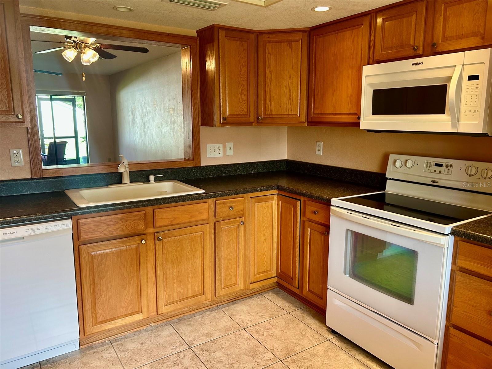 Kitchen With Pass Through To Dining Area