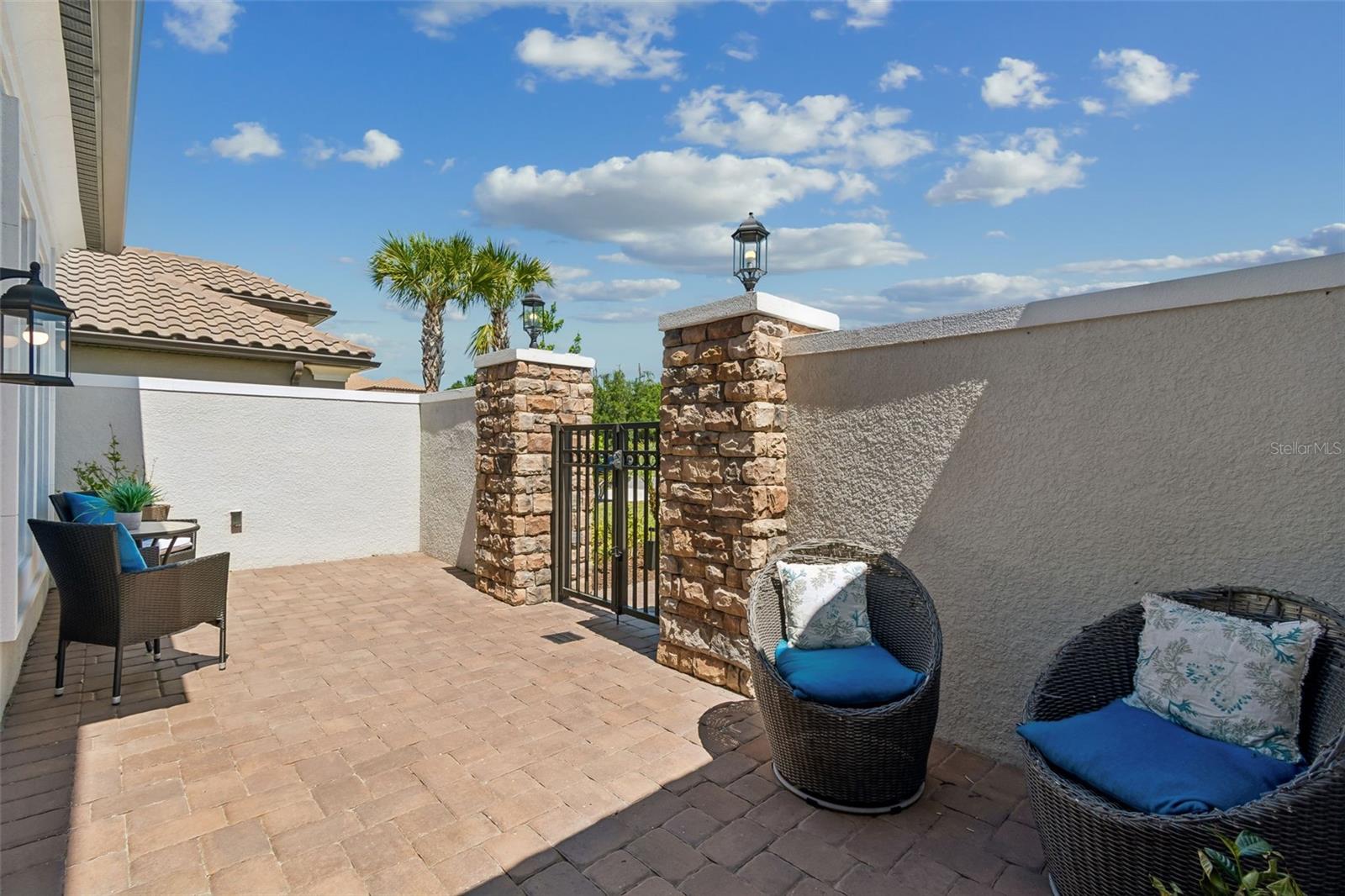 Large stone courtyard with pavers