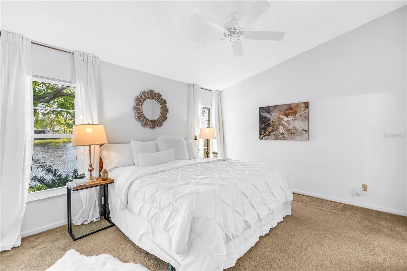 Primary Suite is spacious for a King Bed and Hurricane windows