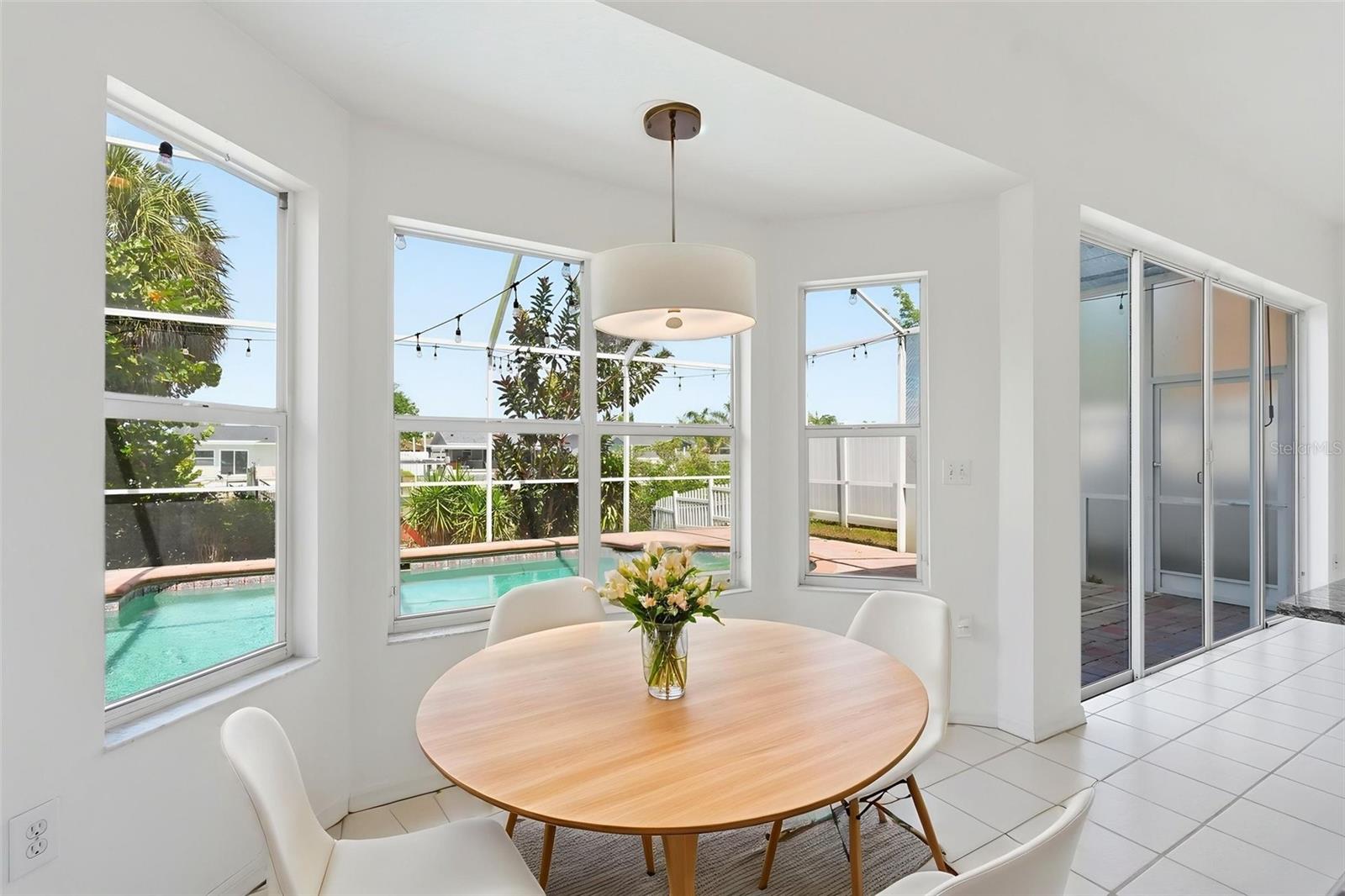Dining Space in Kitchen with Pool View