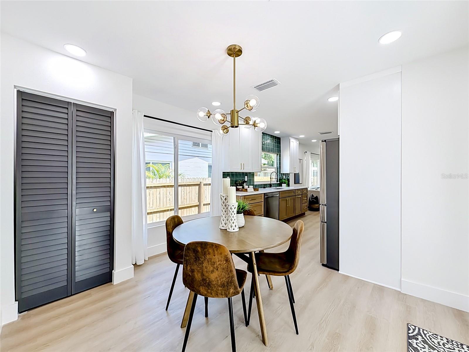 Dining Room with Decorative Chandelier