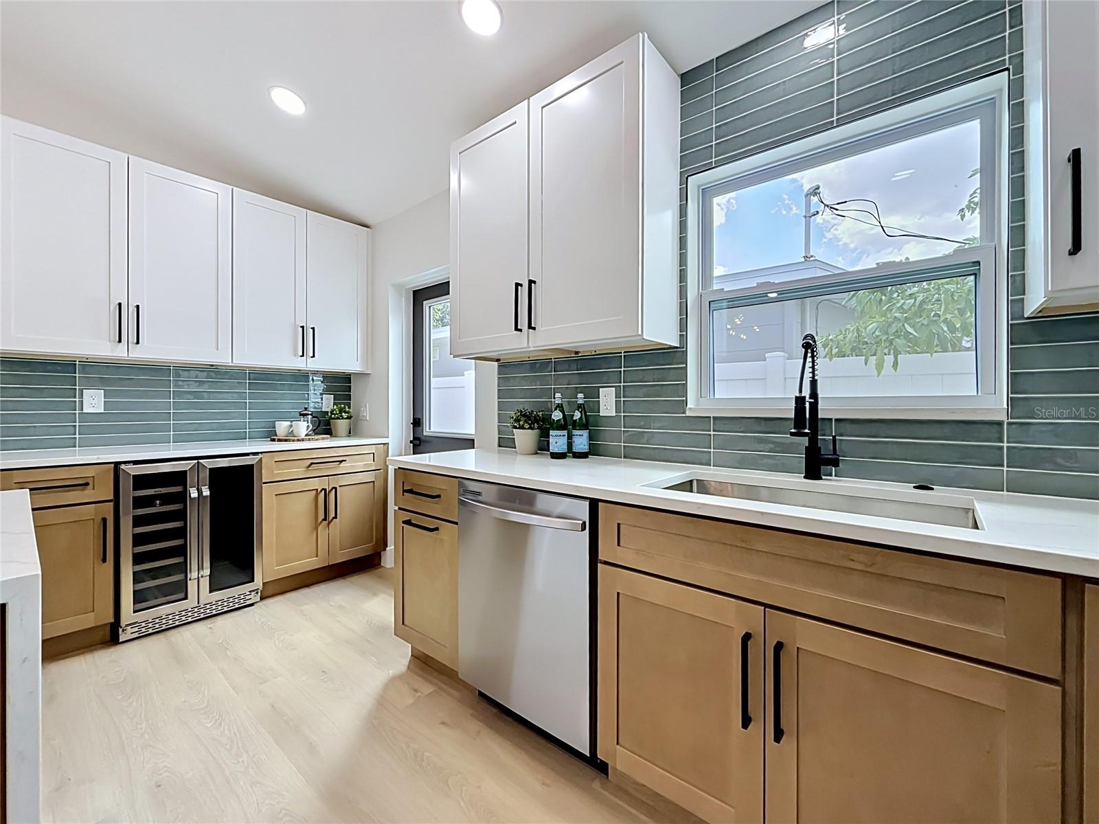 Kitchen with Side Door Leading to Backyard