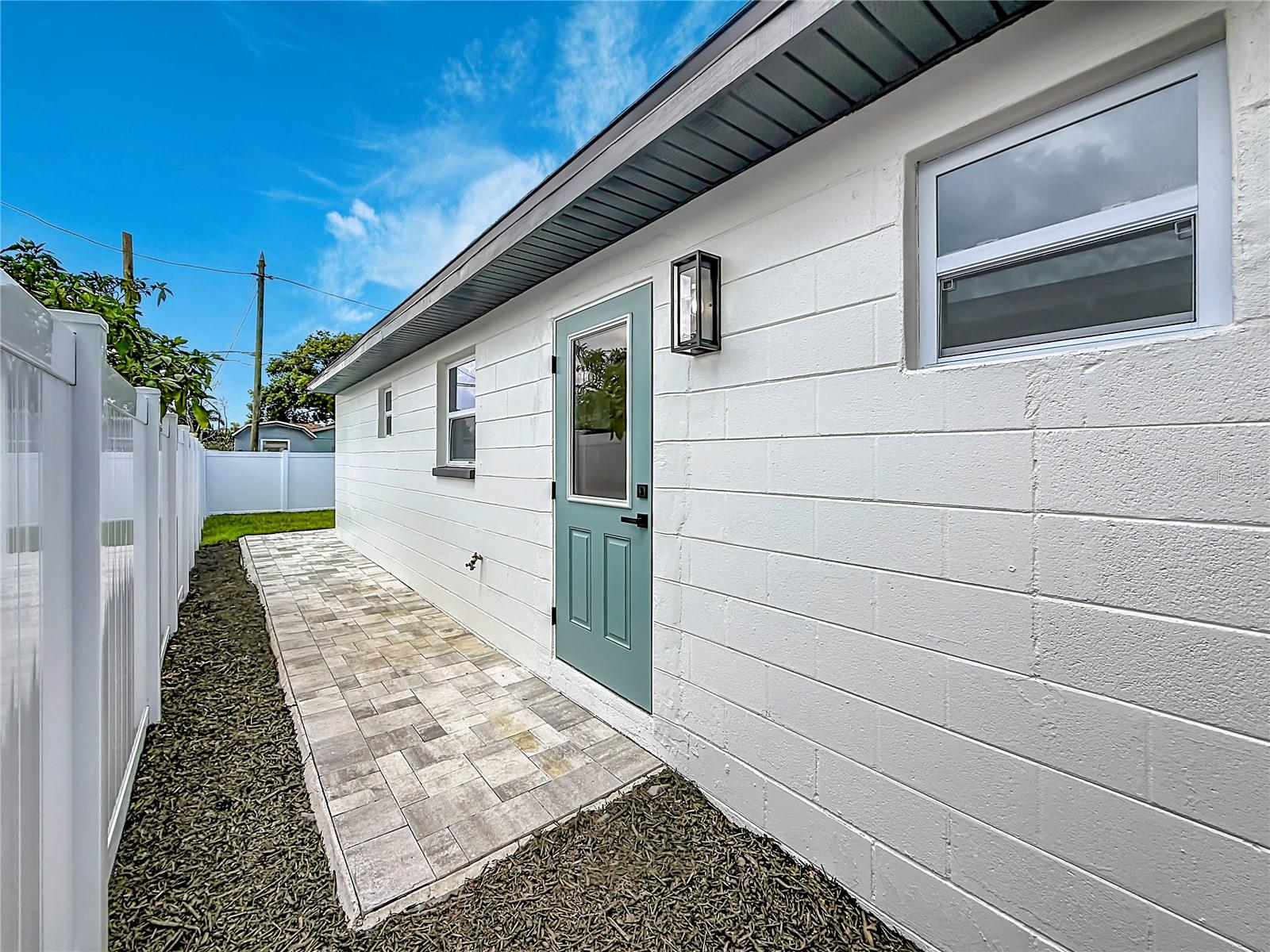 Paver Walkway from Kitchen Leading to Backyard