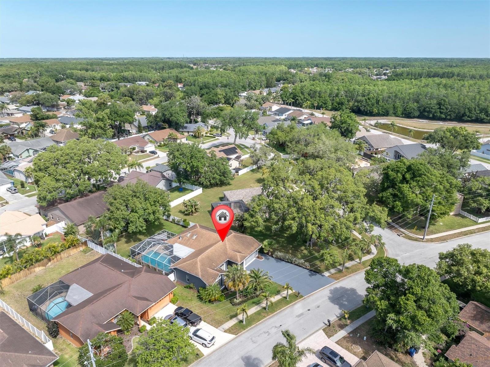 Great Lot w/ New Vinyl Fence and Tropical Landscaping