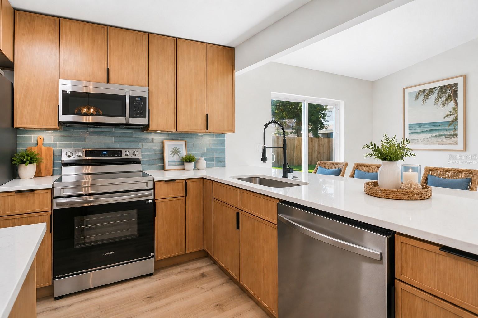 Virtually Staged. Buyer can choose their own backsplash from options at the property for installation prior to closing.