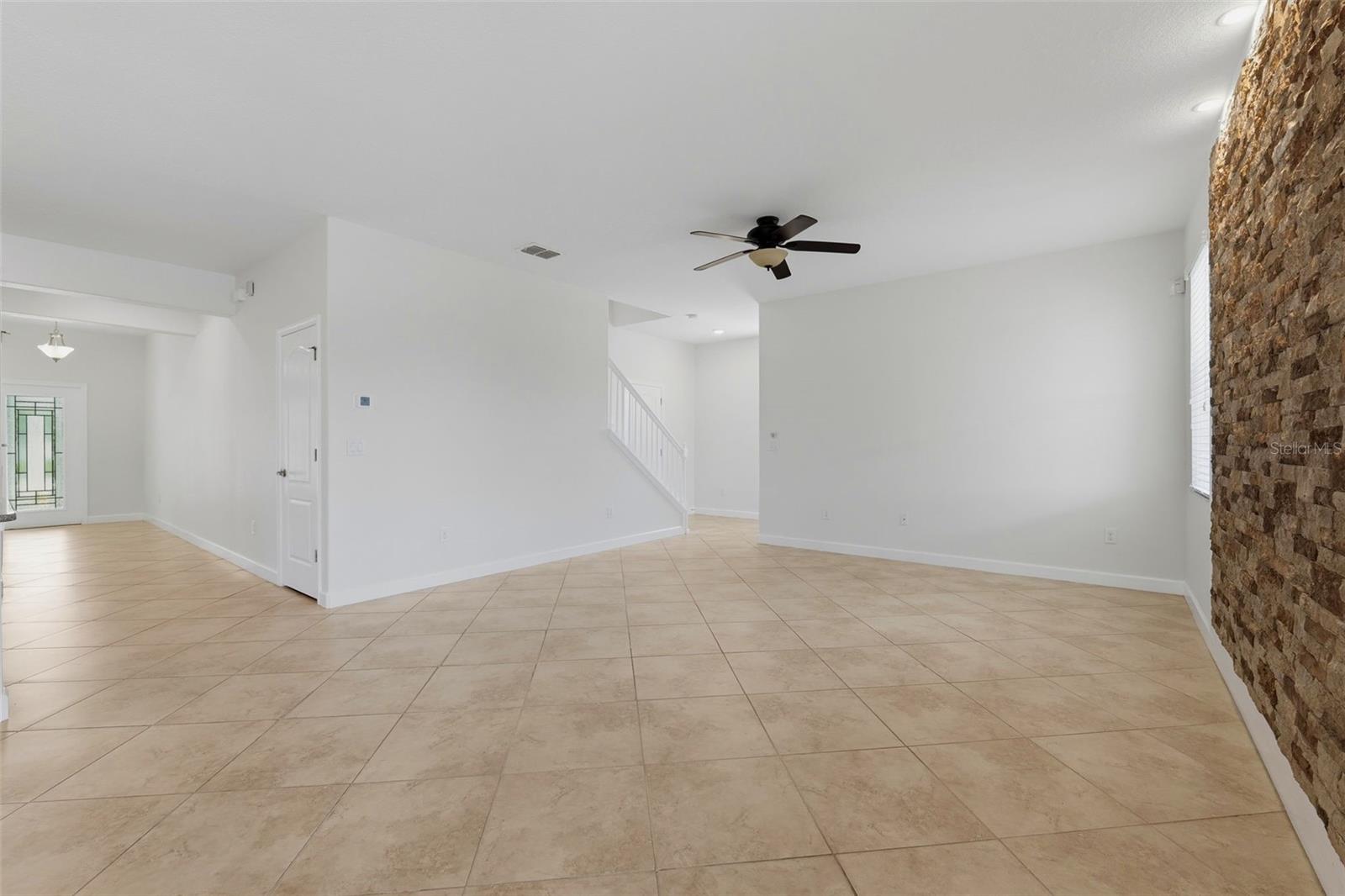 Living Room from Breakfast Nook looking at Stairs