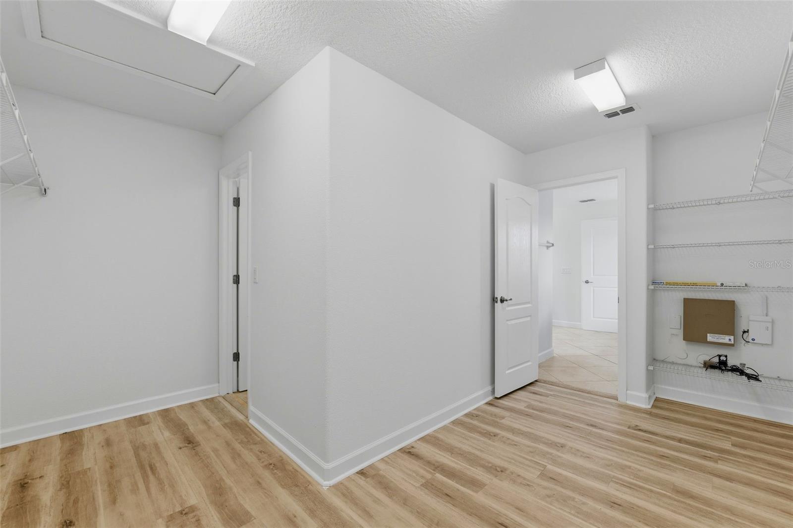 Primary Bedroom Walk in Closet