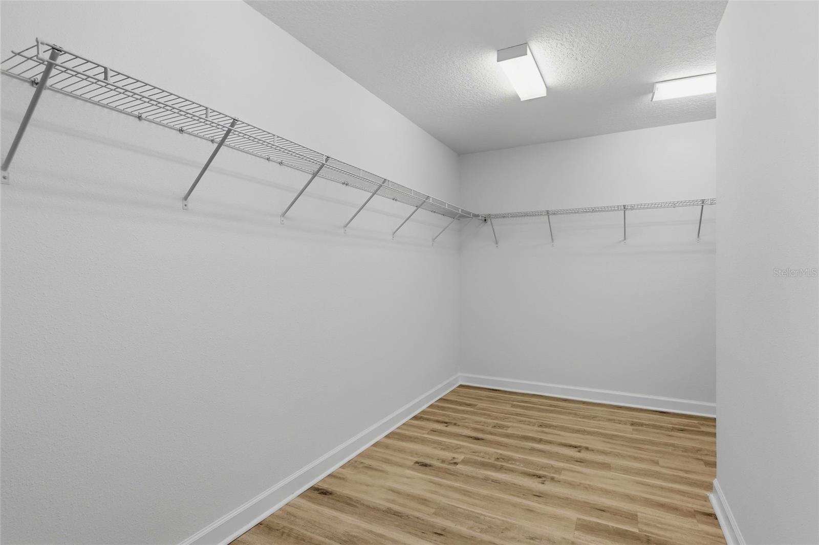 Primary Bedroom Walk in Closet