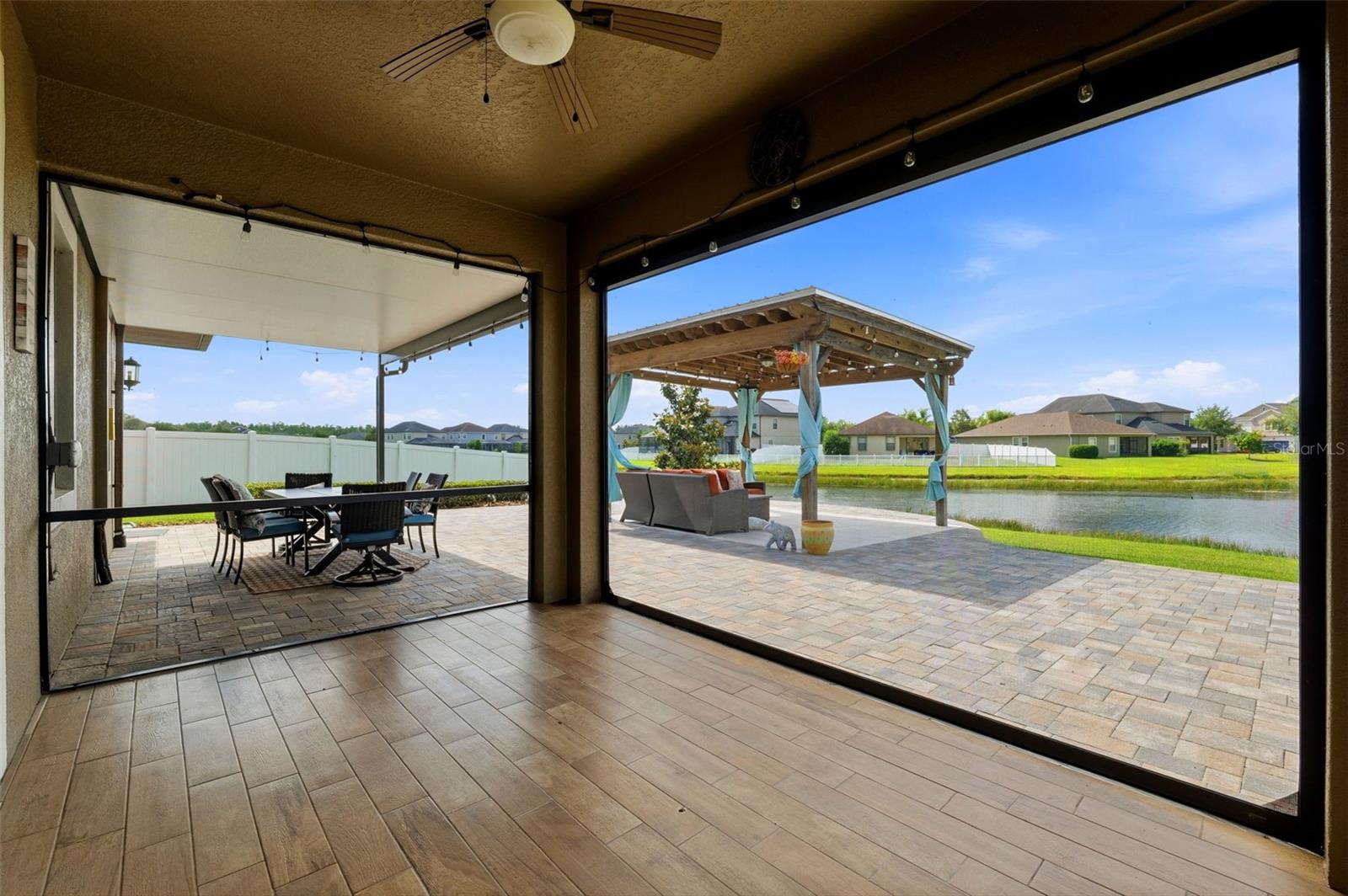 Under Roof Lanai with slide down screen enclosure