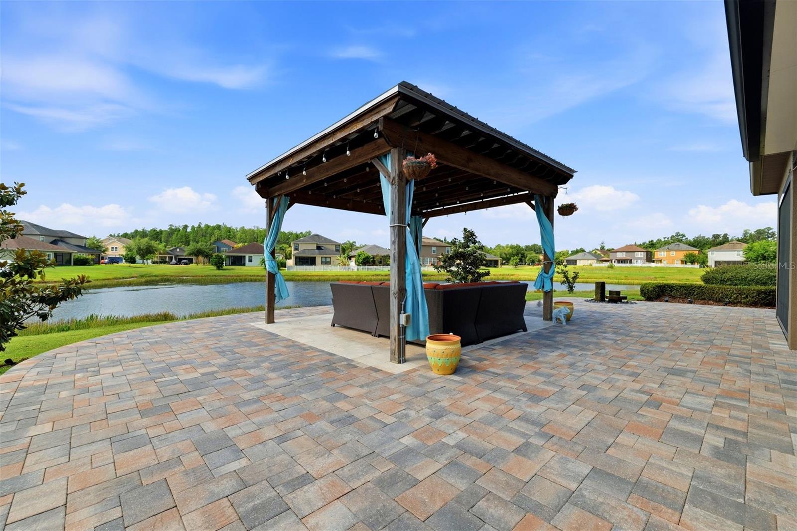 Brick Paver Lanai with Custom Build Pergola