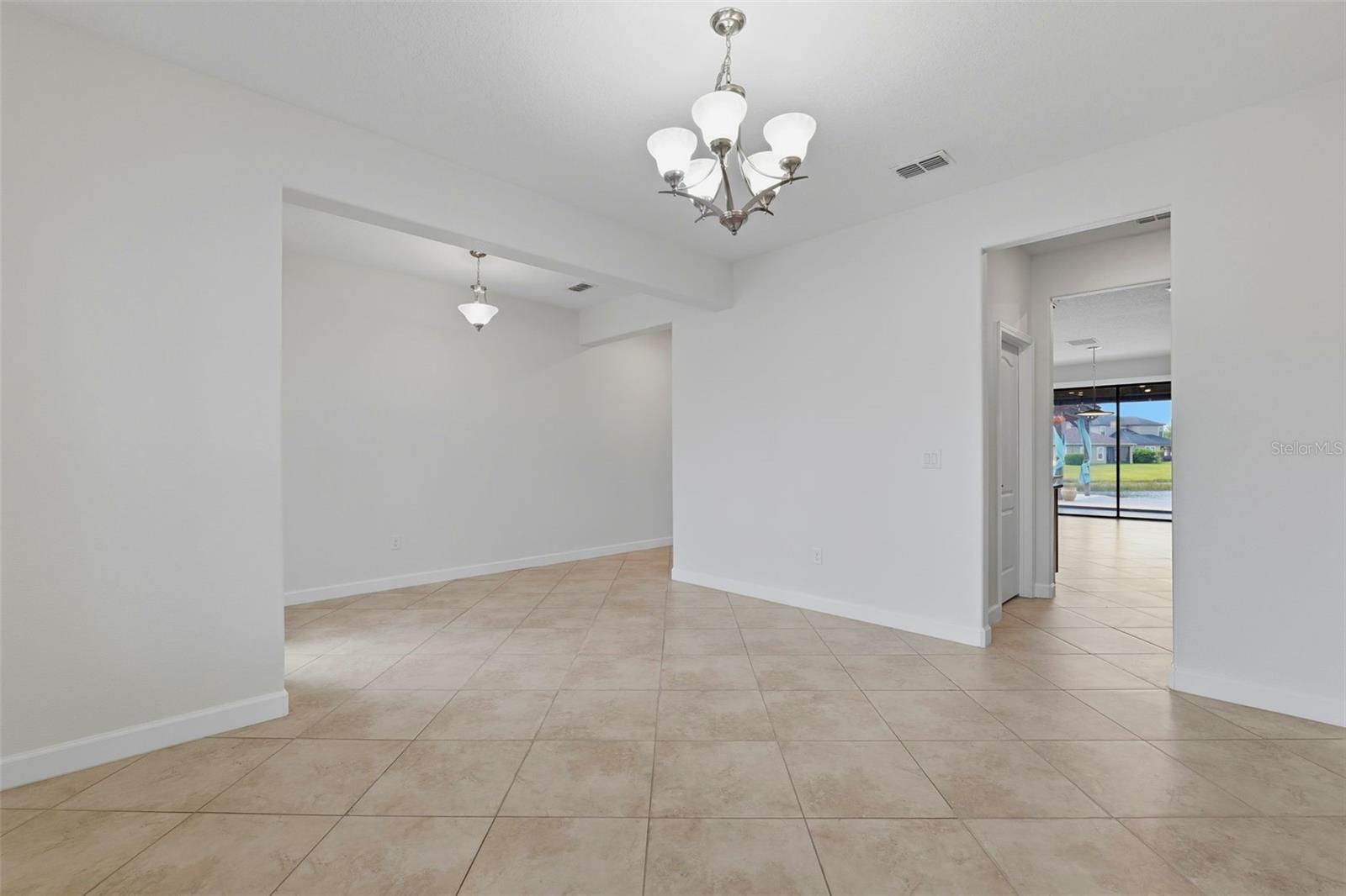 Formal Dining looking towards kitchen with view of Pantry
