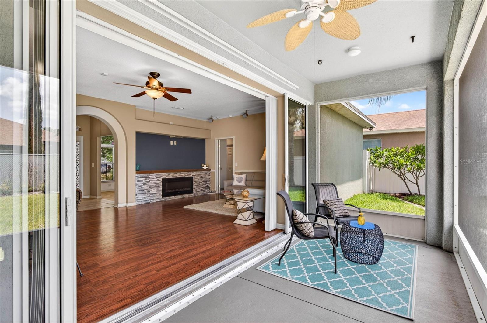 Sliding glass doors pocket open fully to lanai