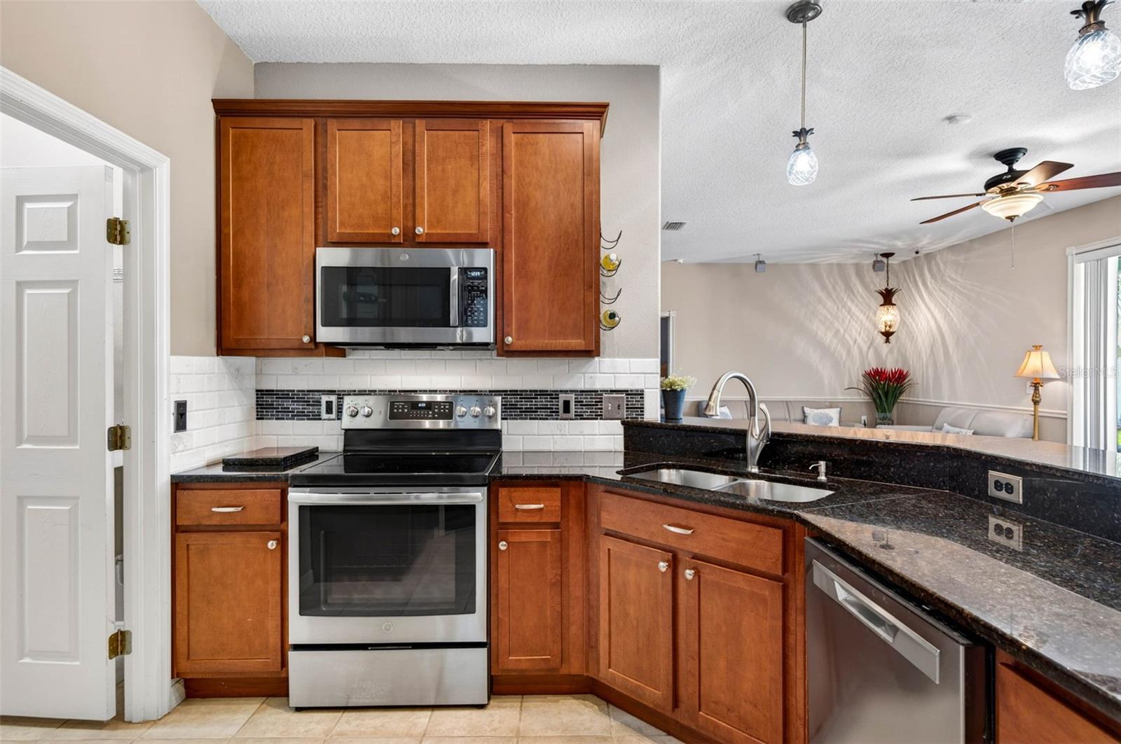 kitchen door to left easily accessible to the left from garage carrying in groceries