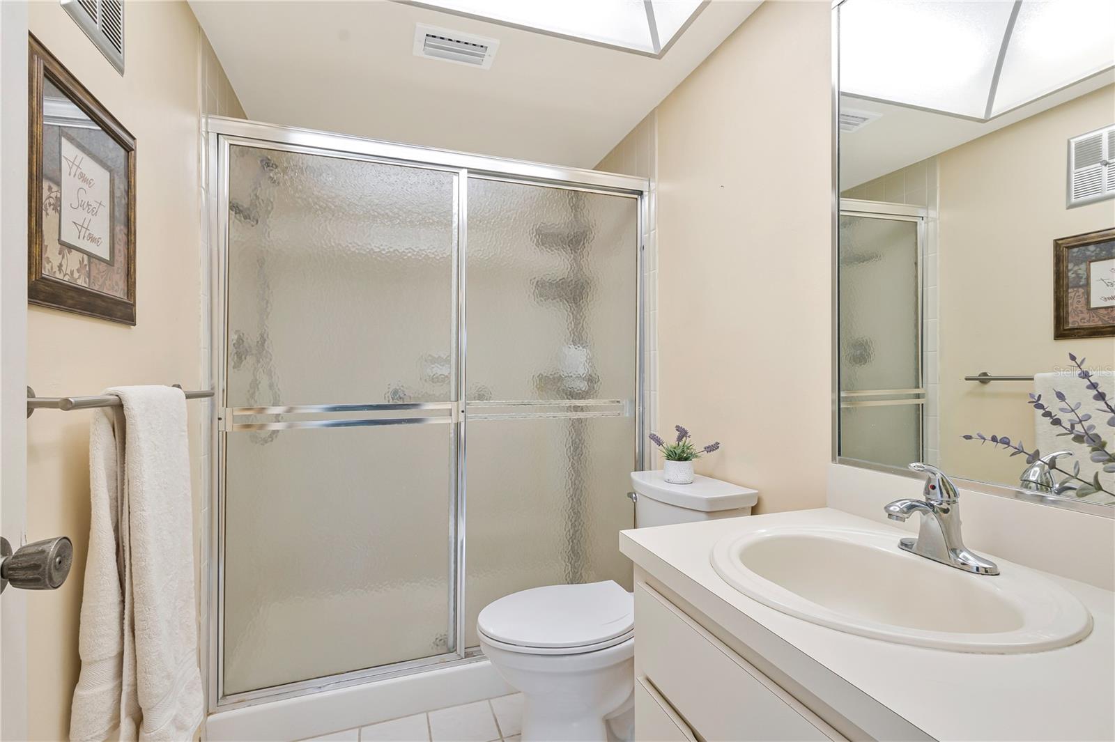 Ensuite bath with step in shower