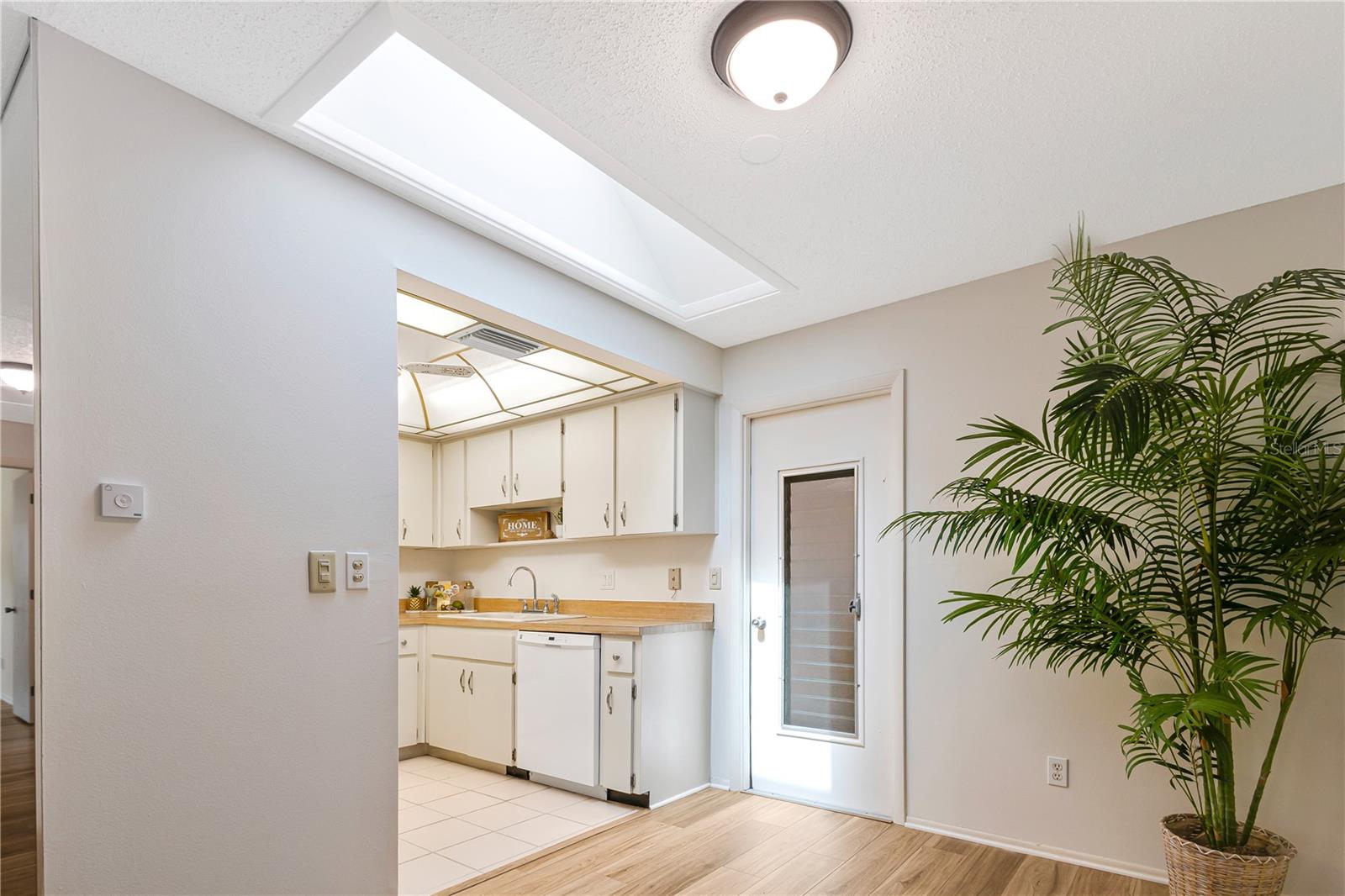 Skylight allows natural light inside the unit. Best part is it is retractable, so you close it anytime you want.
