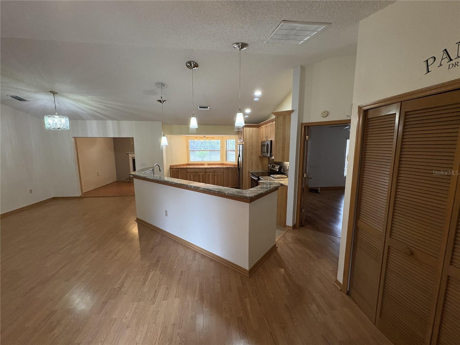 View of Living/family room and kitchen