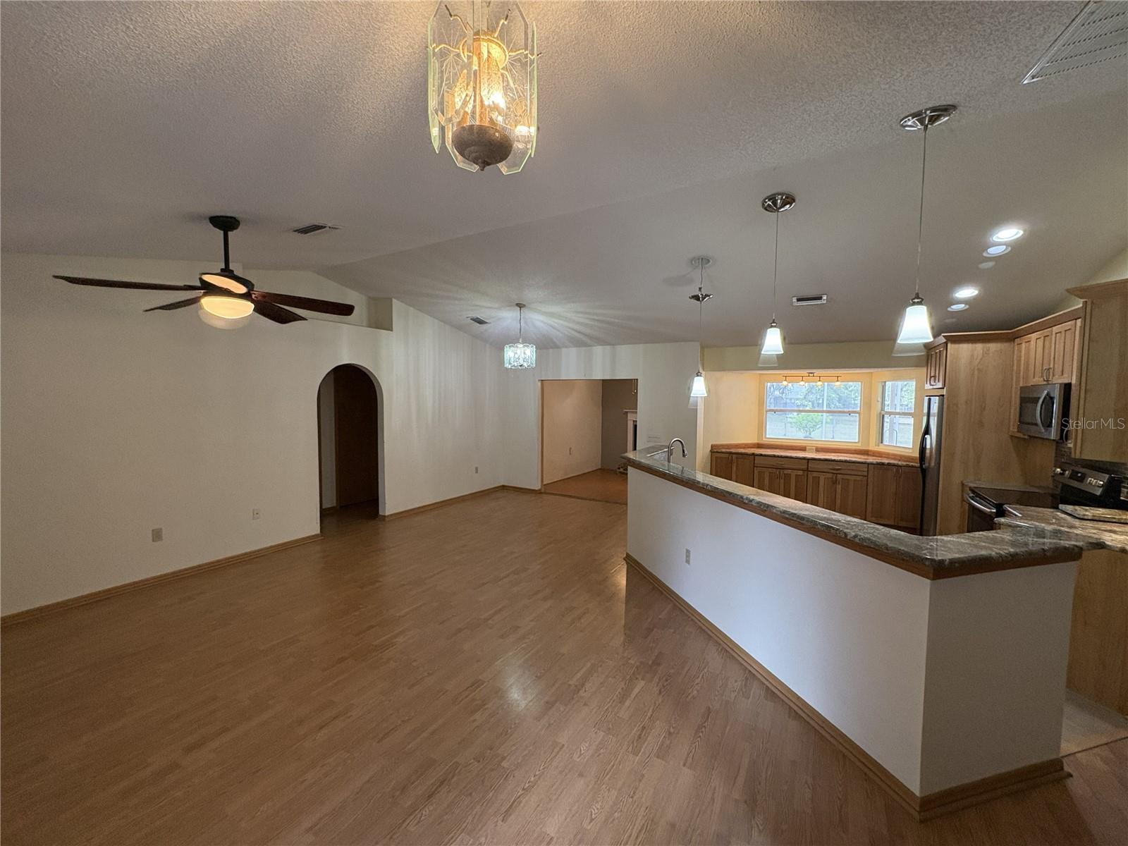 View of family room and kitchen
