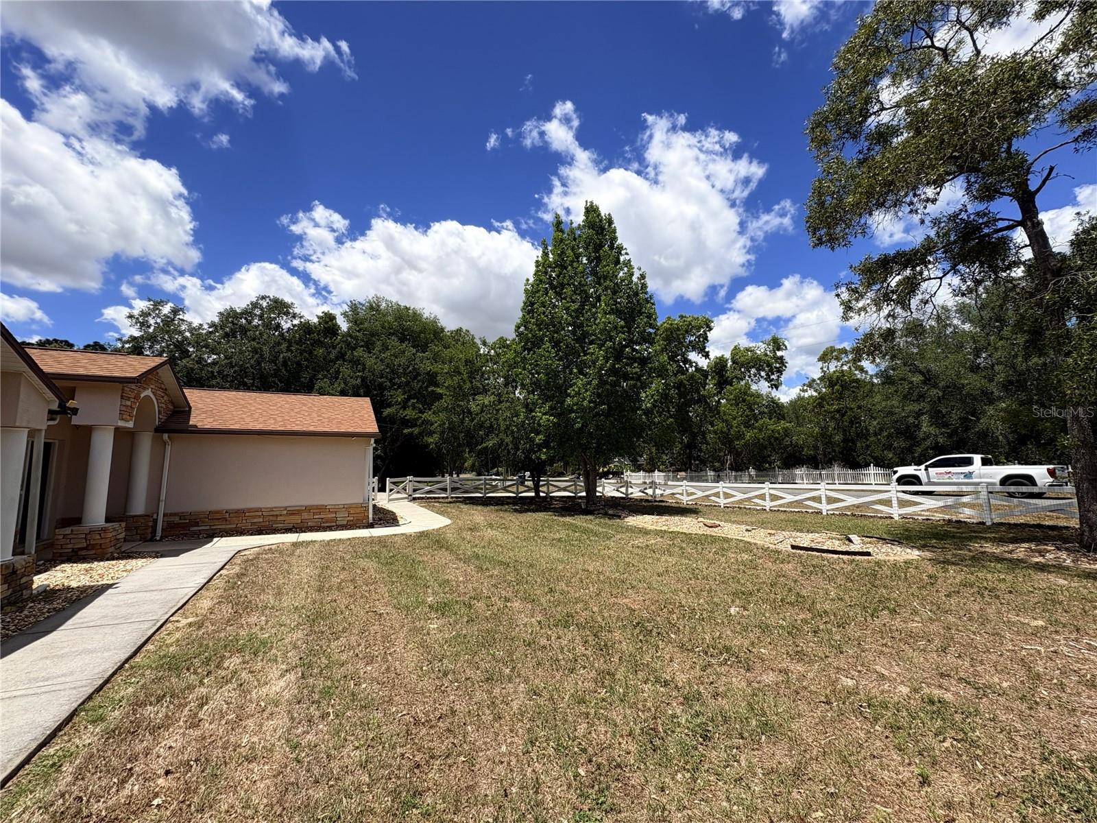 Front from left side of house