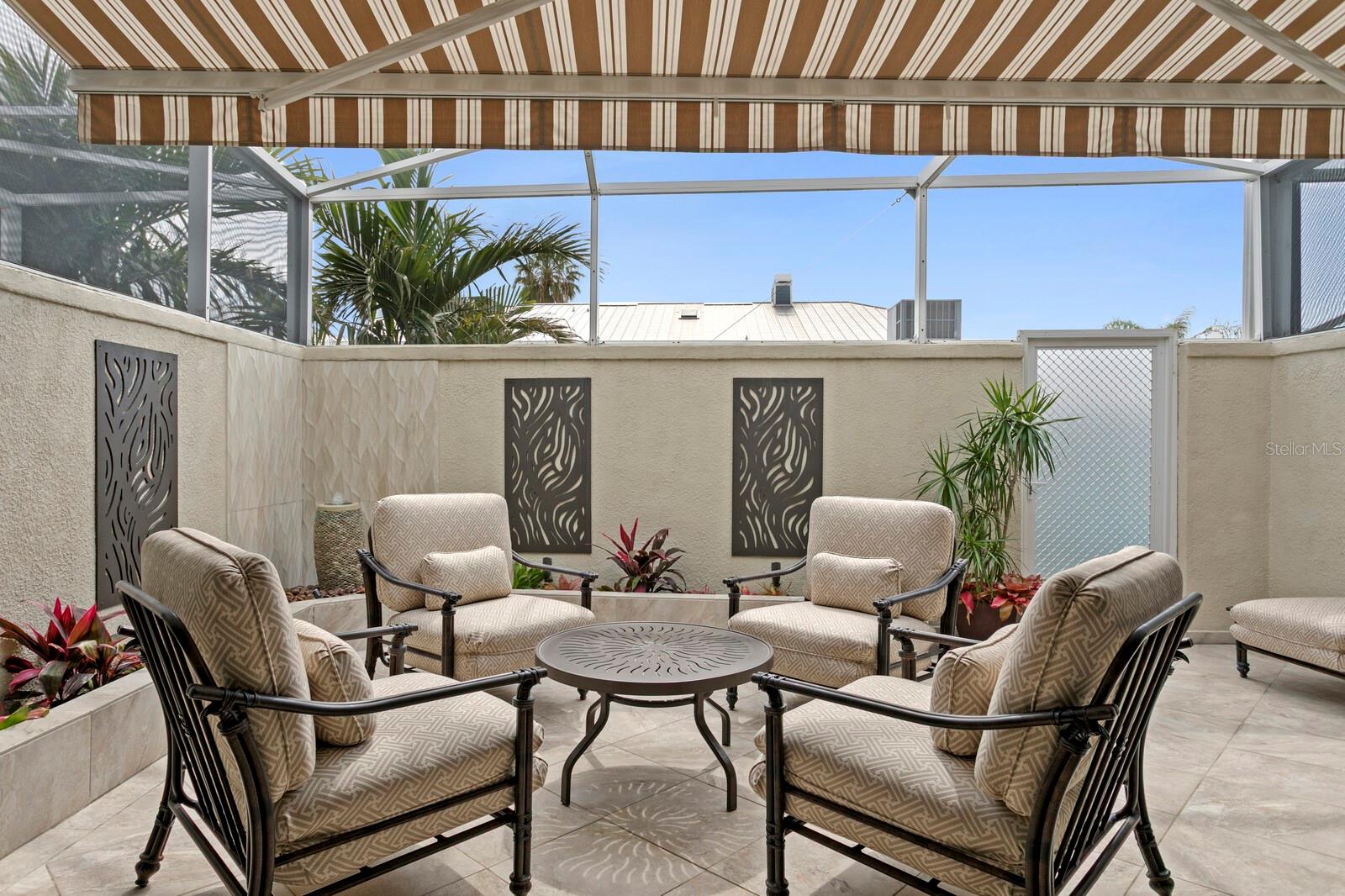 Private screened courtyard with awining