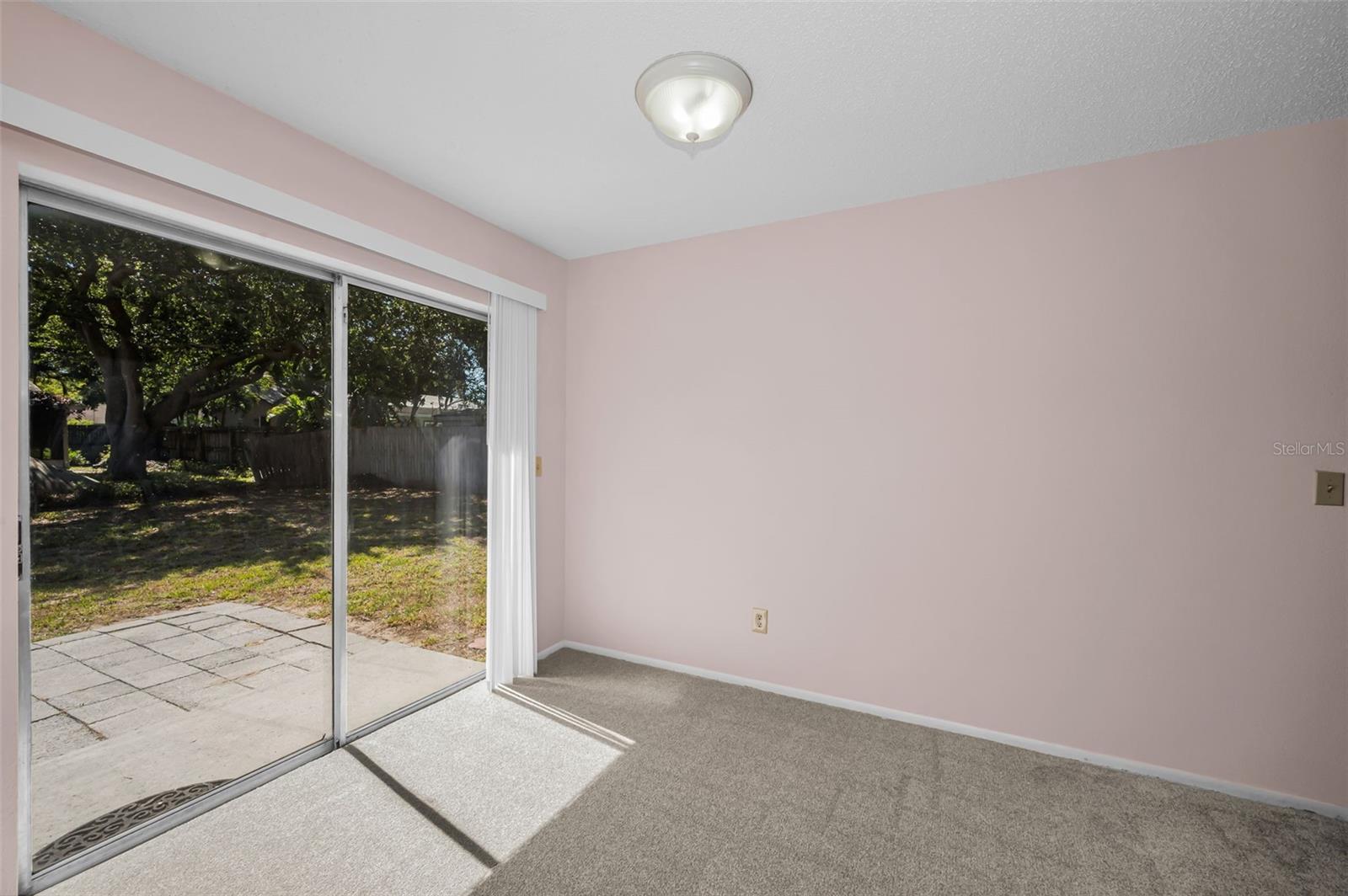 Dining area with sliders to rear patio