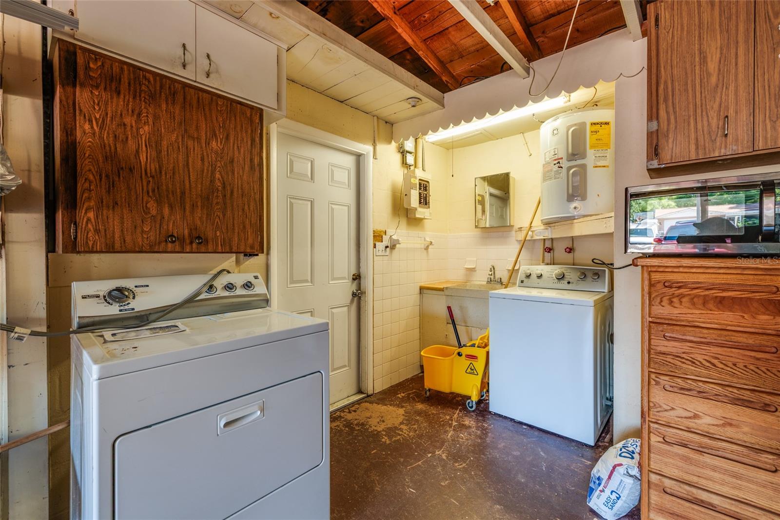 Laundry and Sink in Garage