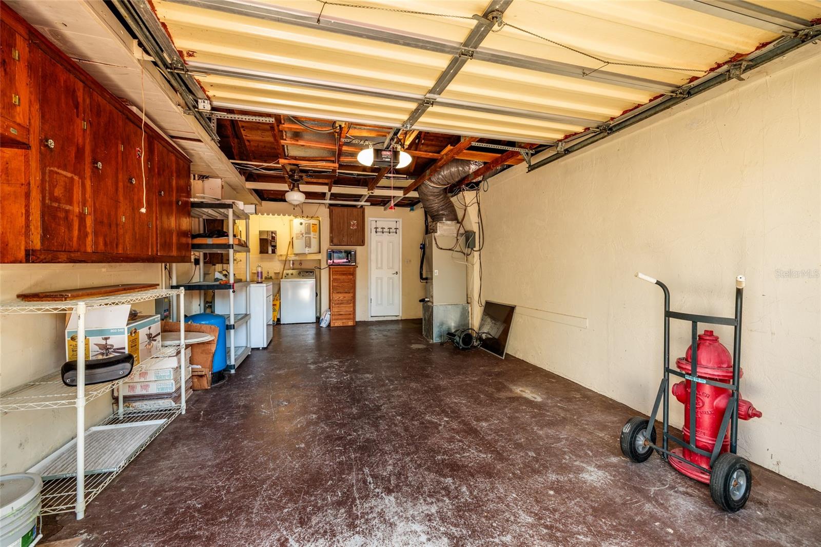Deep Garage with Cabinets