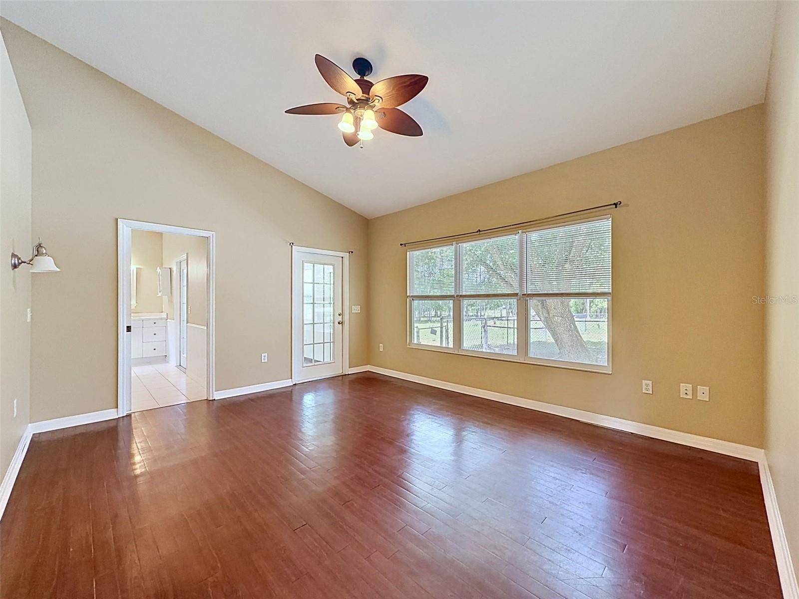 Primary Bedroom with en suite bath & private sunroom
