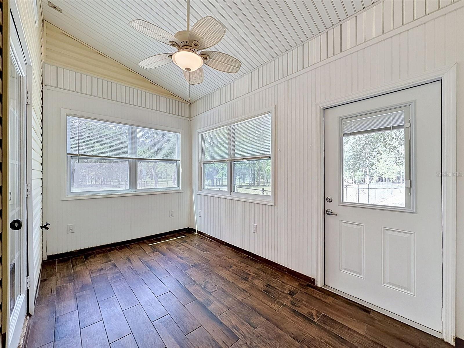 Enclosed Sunroom off Primary Bedroom