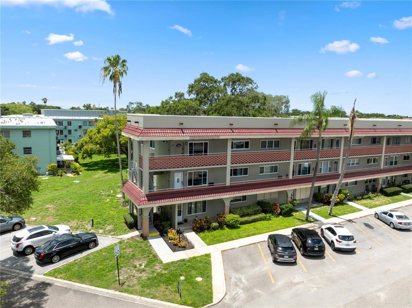 Beautiful top floor corner unit with assigned parking in first spot close to stairs