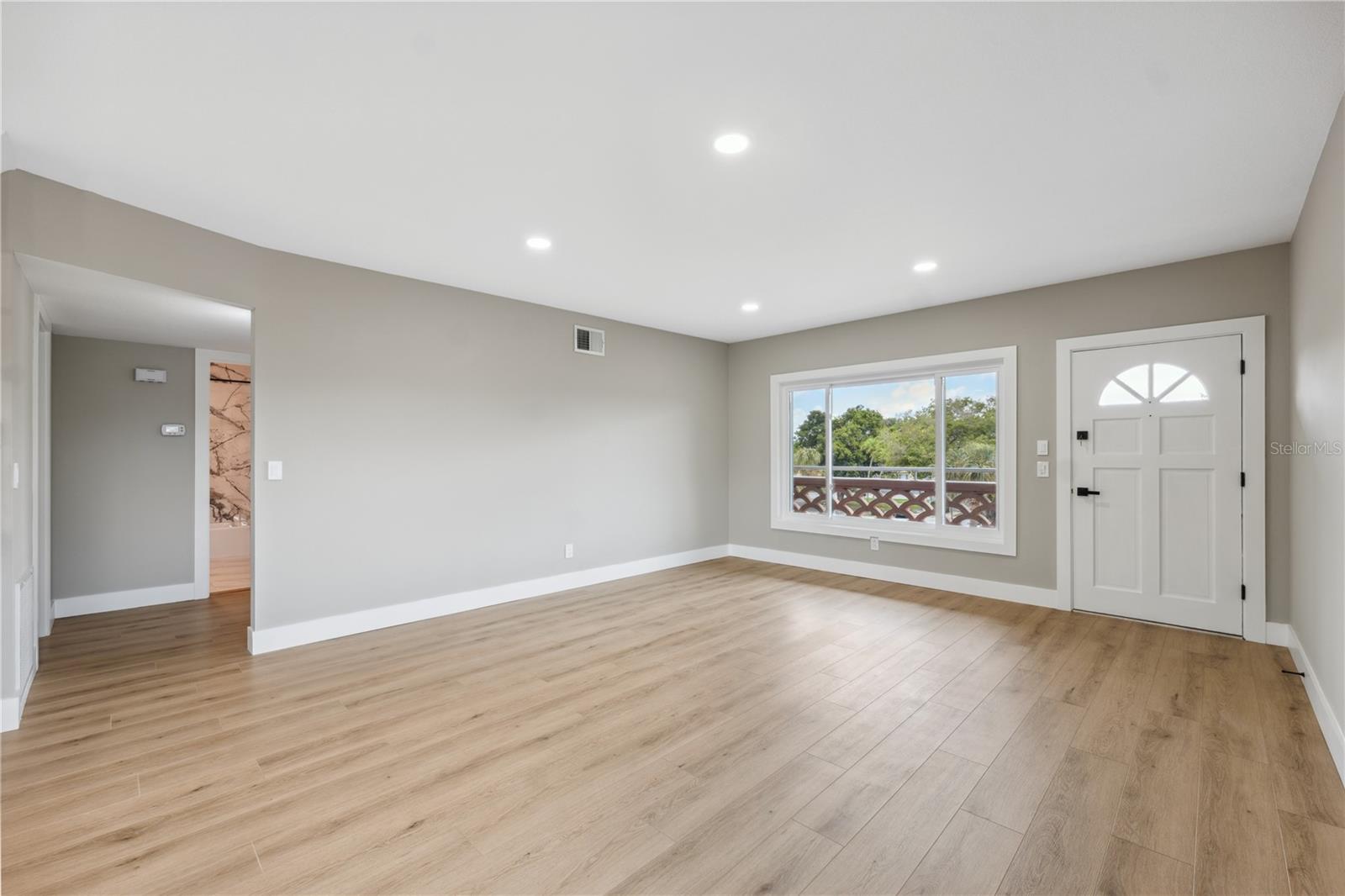 Fully renovated unit including LVP flooring, brand new windows throughout & freshly painted walls & trim