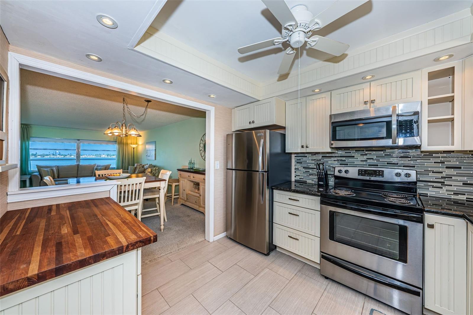 Open kitchen with stainless steel appliances