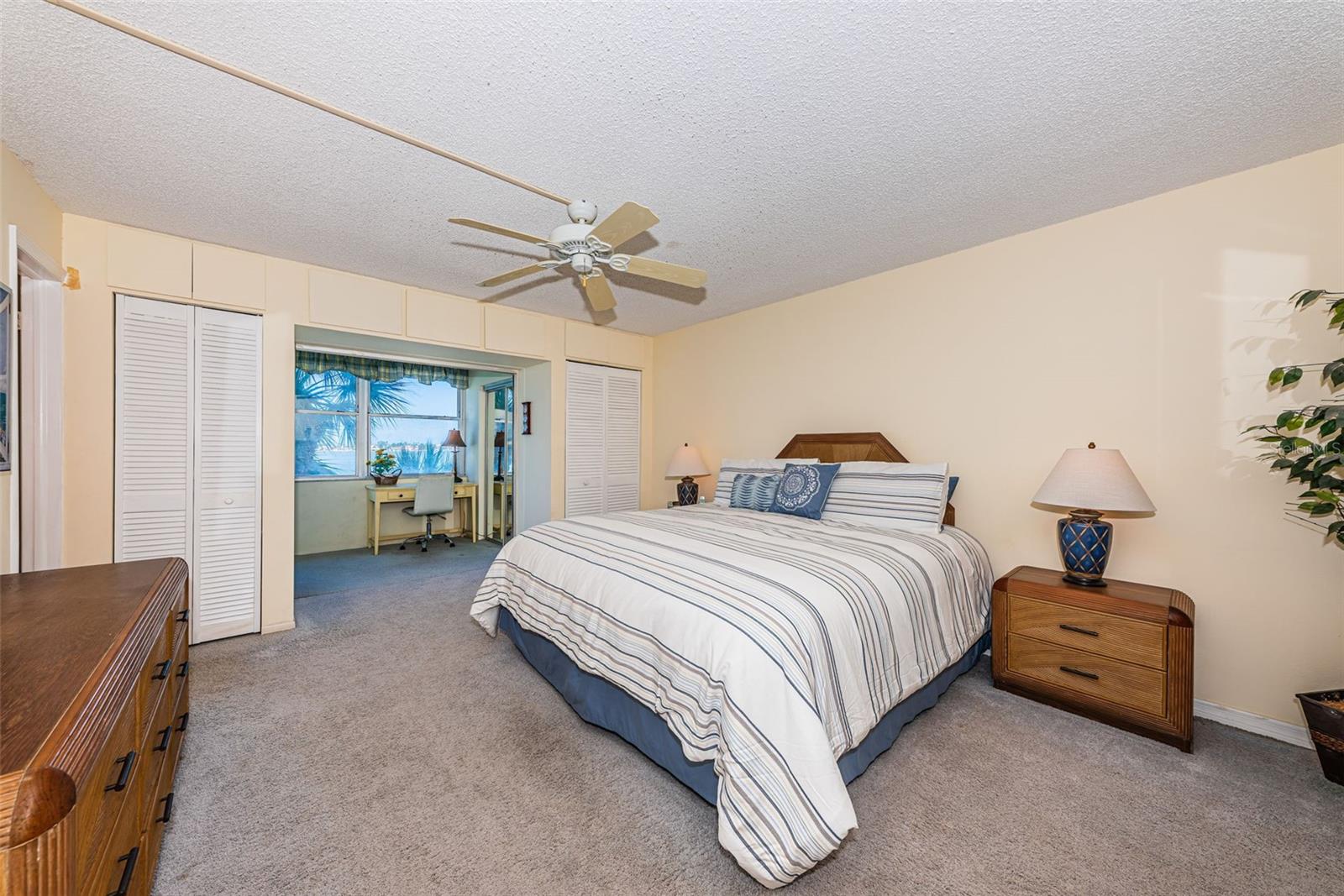Primary bedroom with access to sunroom