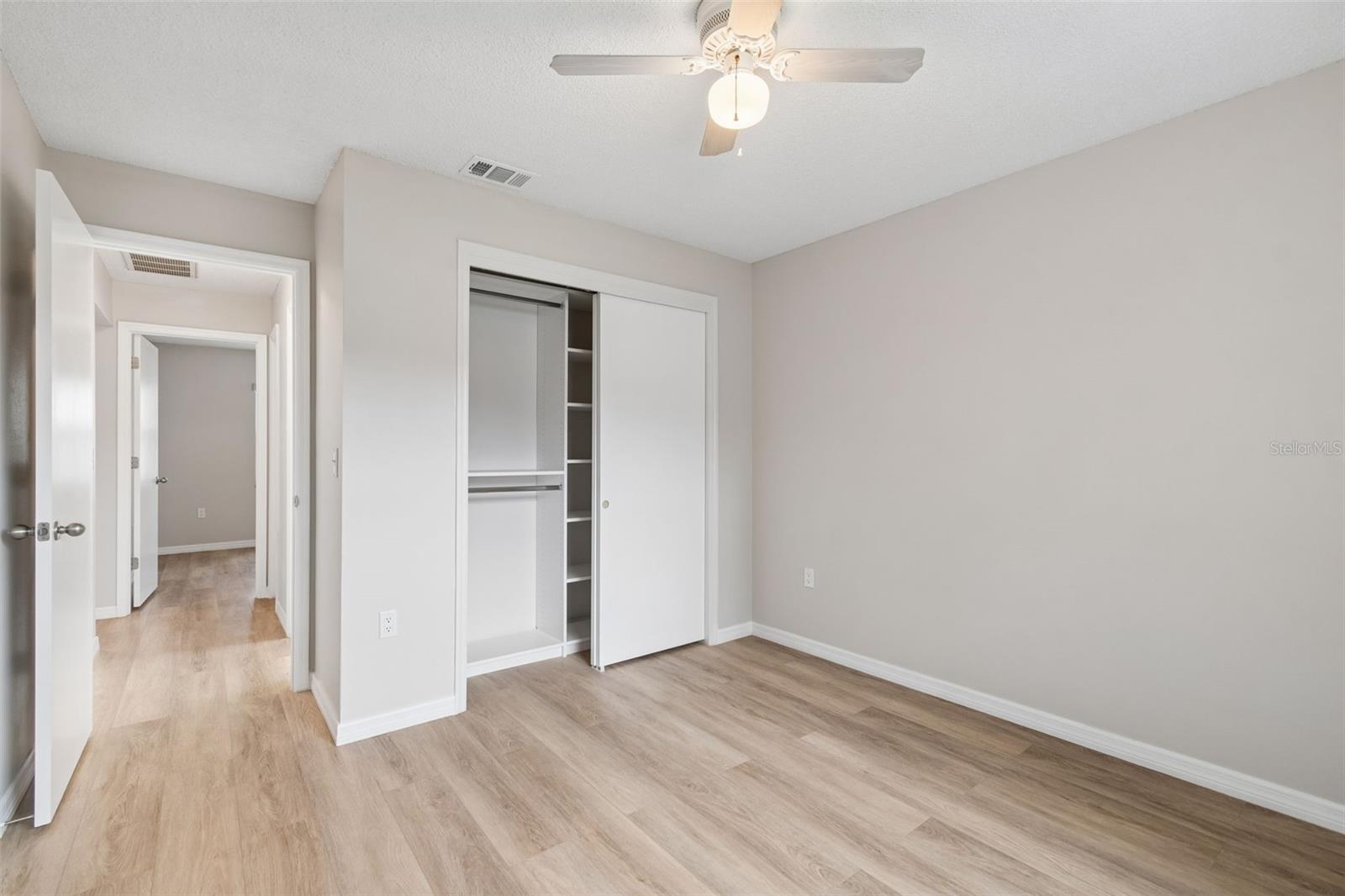 bedroom 3 with built in closets