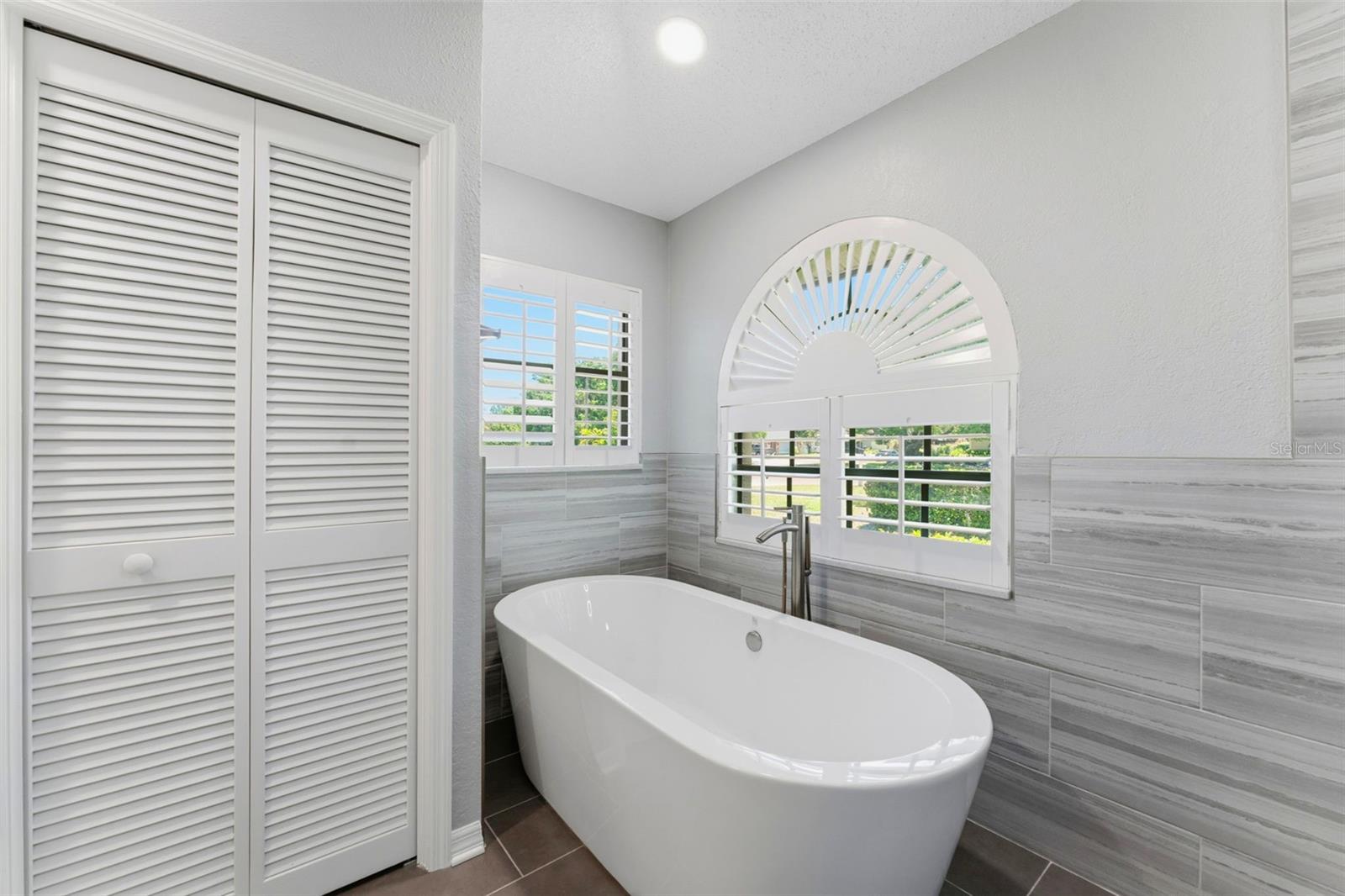Master Bathroom with a Tub